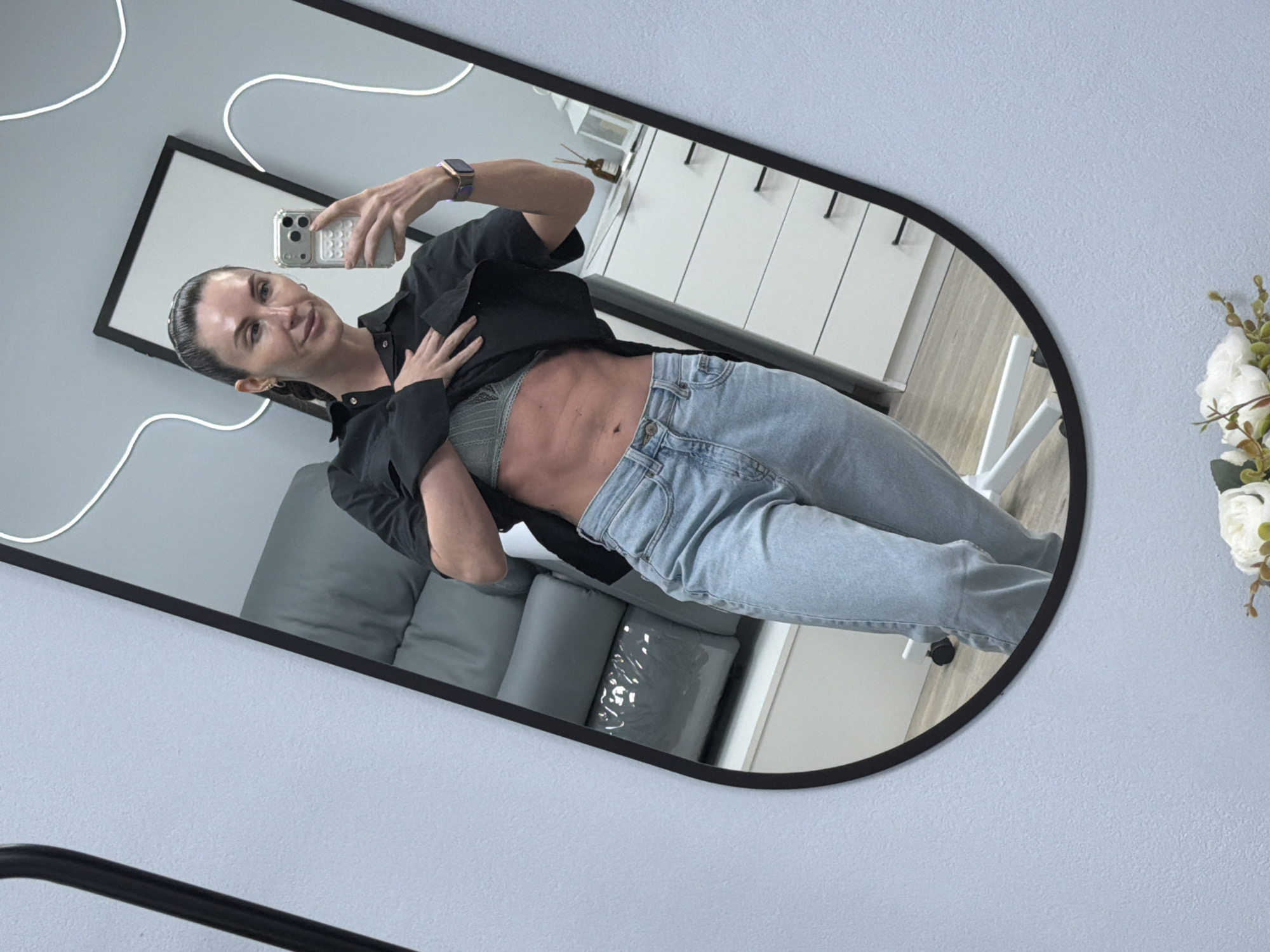 Woman takes mirror selfie in Perm, Russia