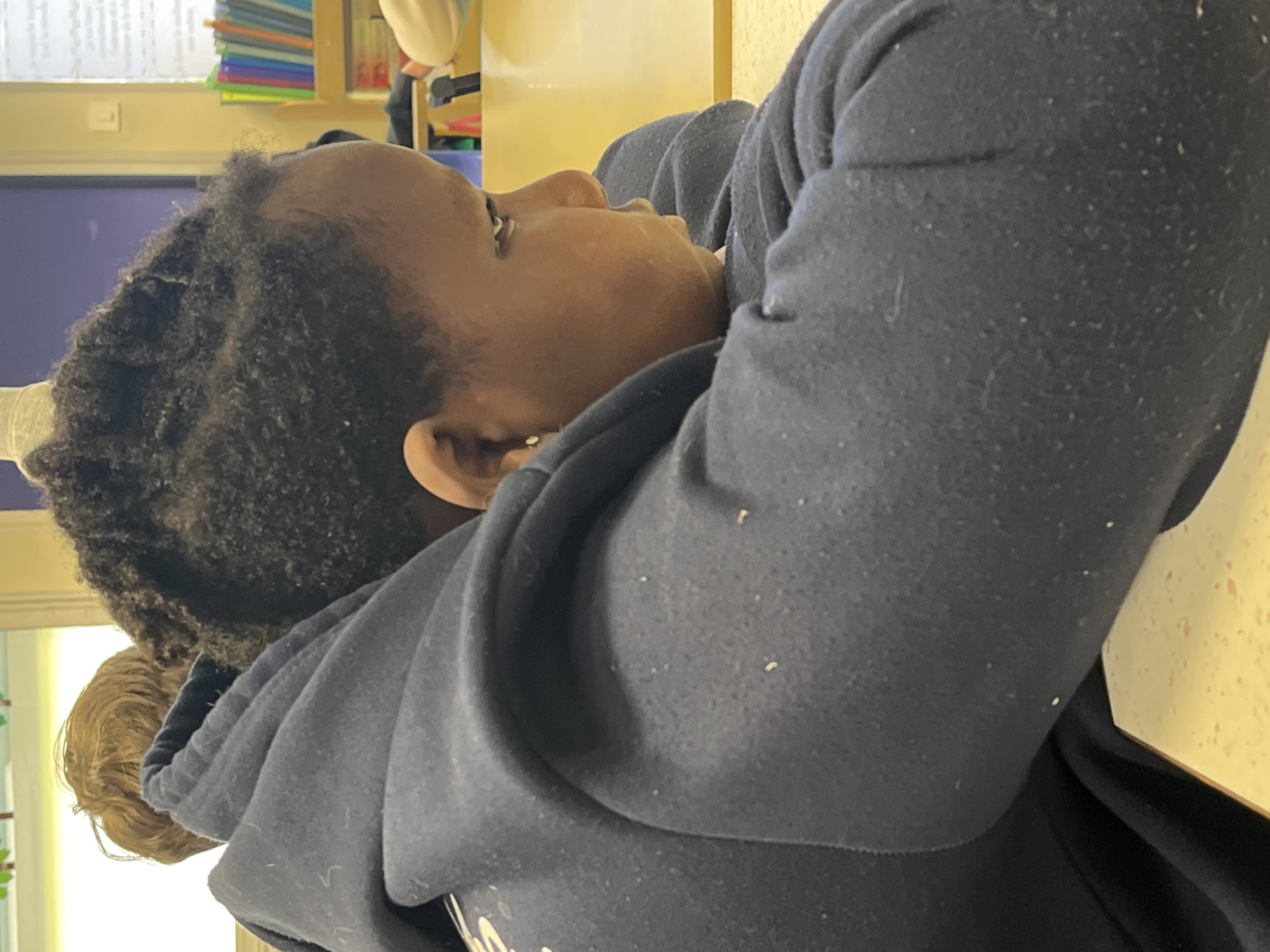 Child rests quietly in French town