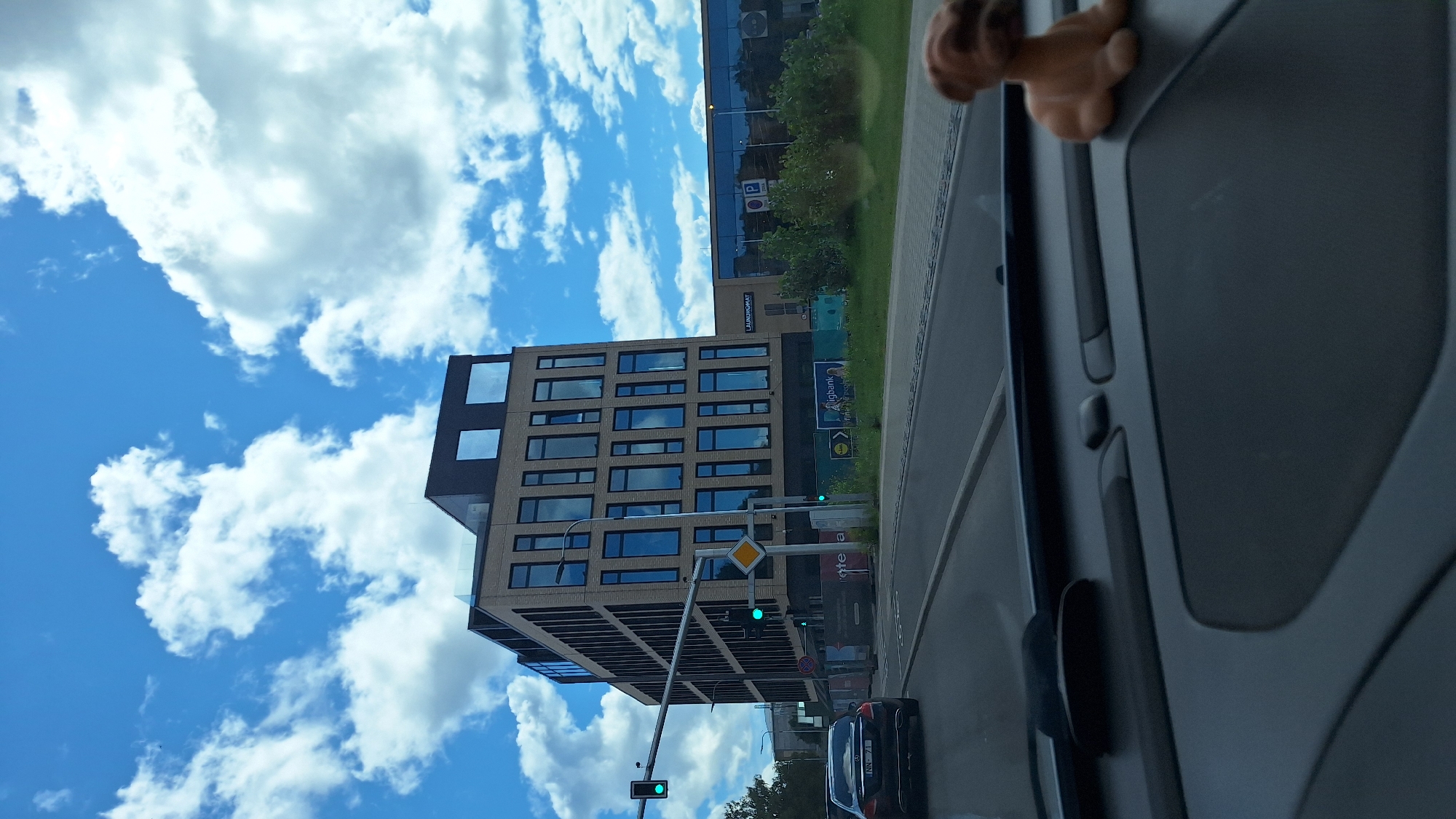 Driving through central Riga on a clear summer afternoon