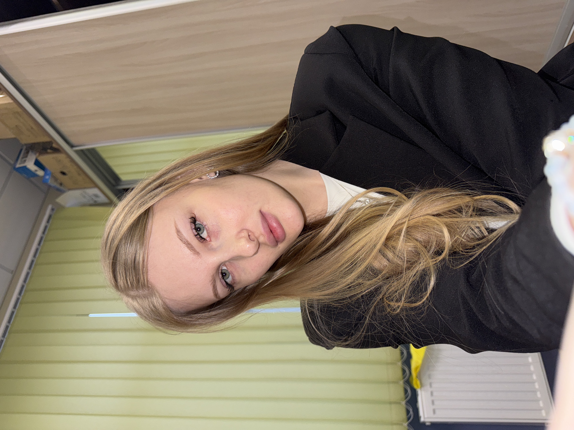 Young women photographed in office, classroom settings in Perm