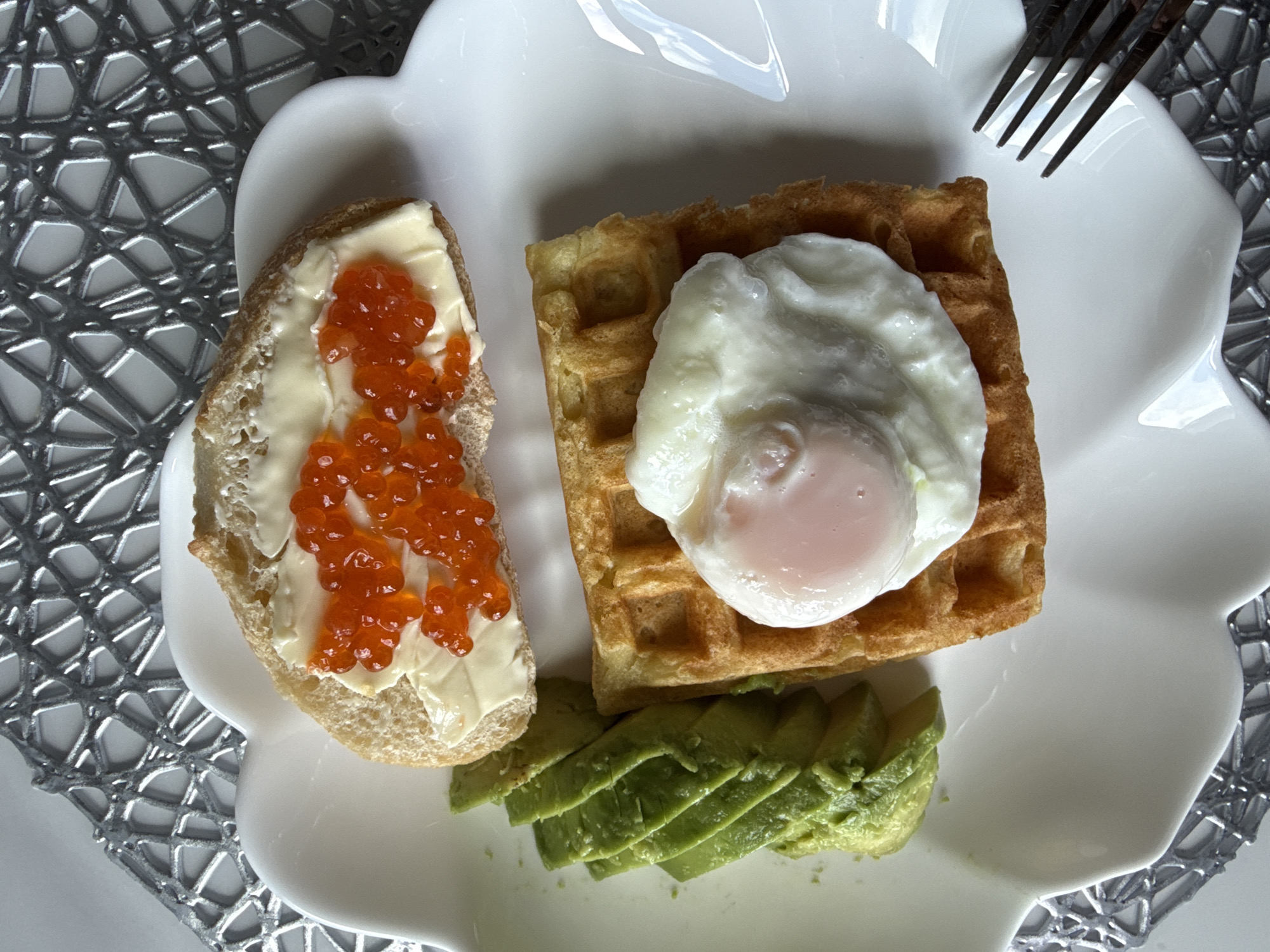 Avocado and egg waffle breakfast, plated up in Khimki