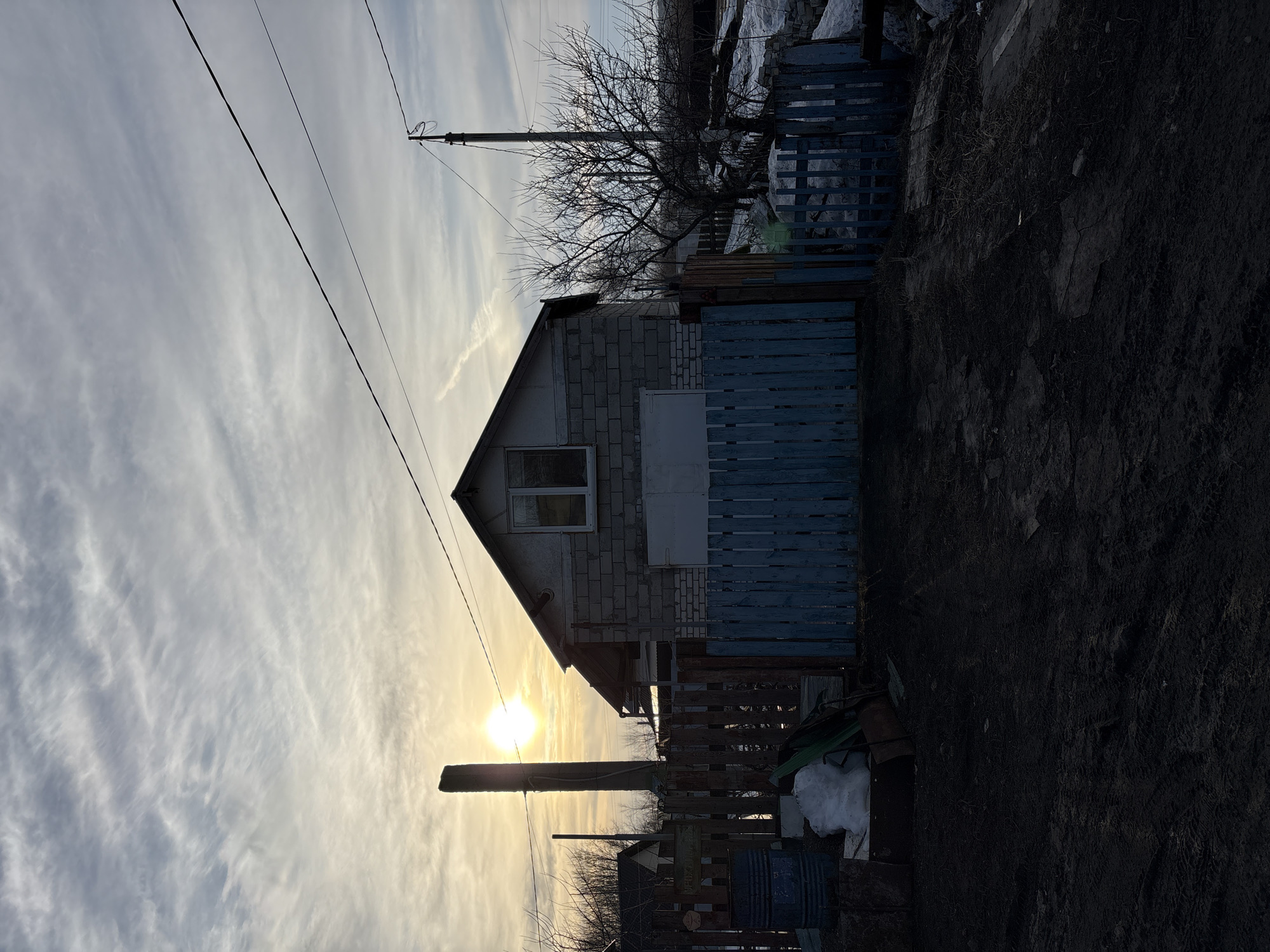 Residents navigate muddy streets in Ulyanovsk neighborhood scenes