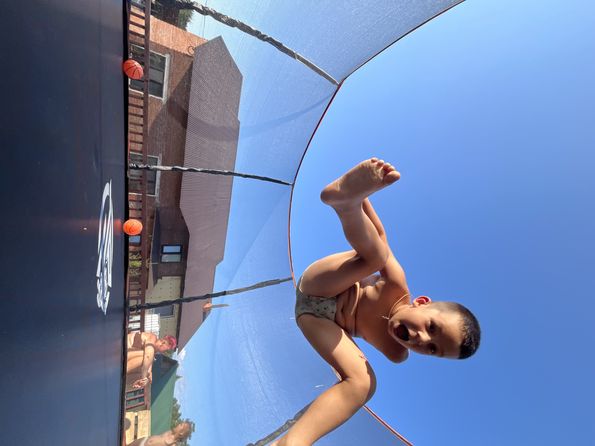 Sunny afternoon outside in Chaikovsky — trampolining and watermelon