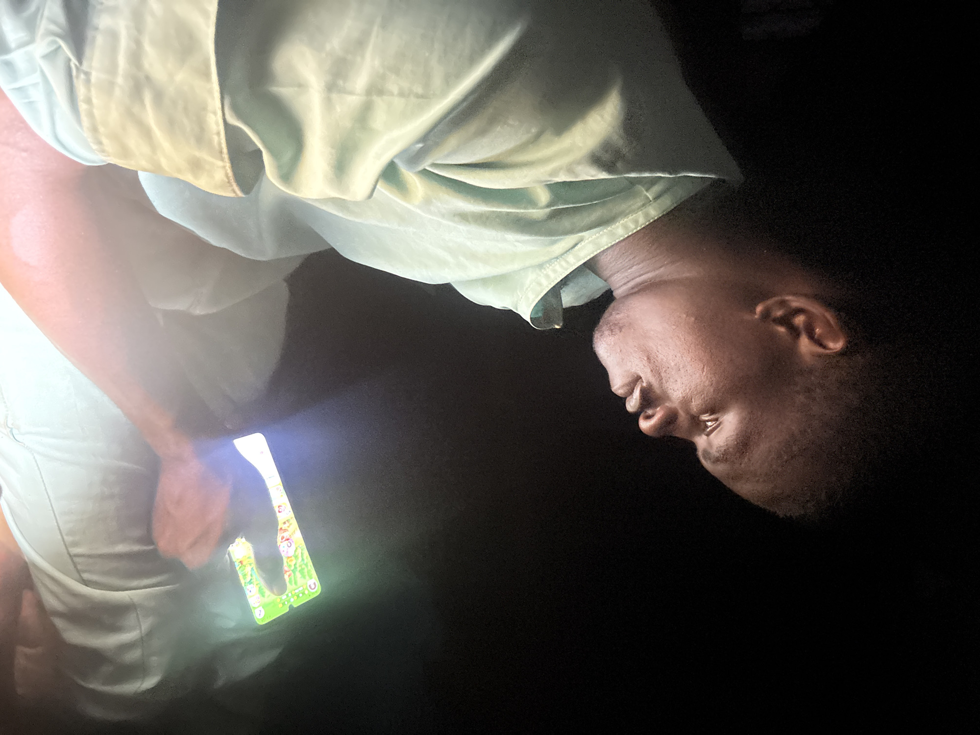 Nighttime social gathering documented through selfies in Epe, Nigeria
