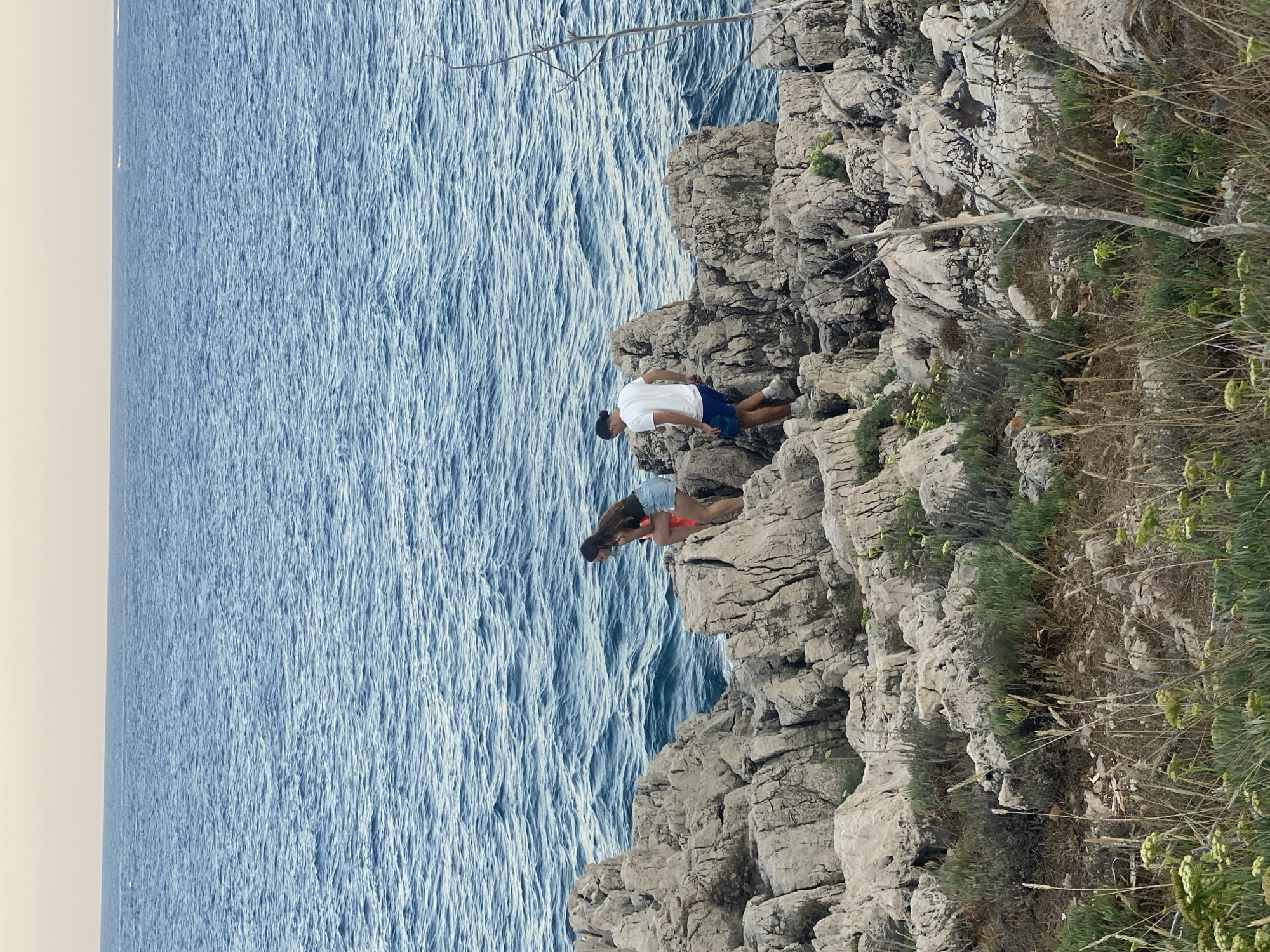 Rocky Mediterranean shoreline near Antibes on a summer evening