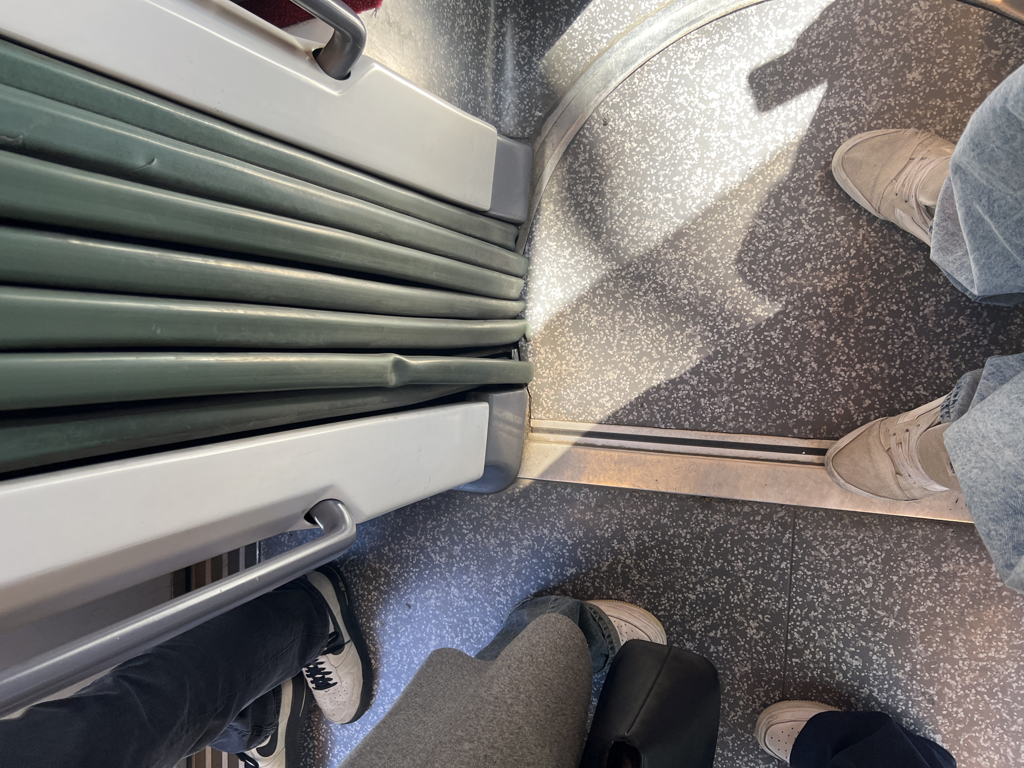 Passengers ride Strasbourg tram during morning commute
