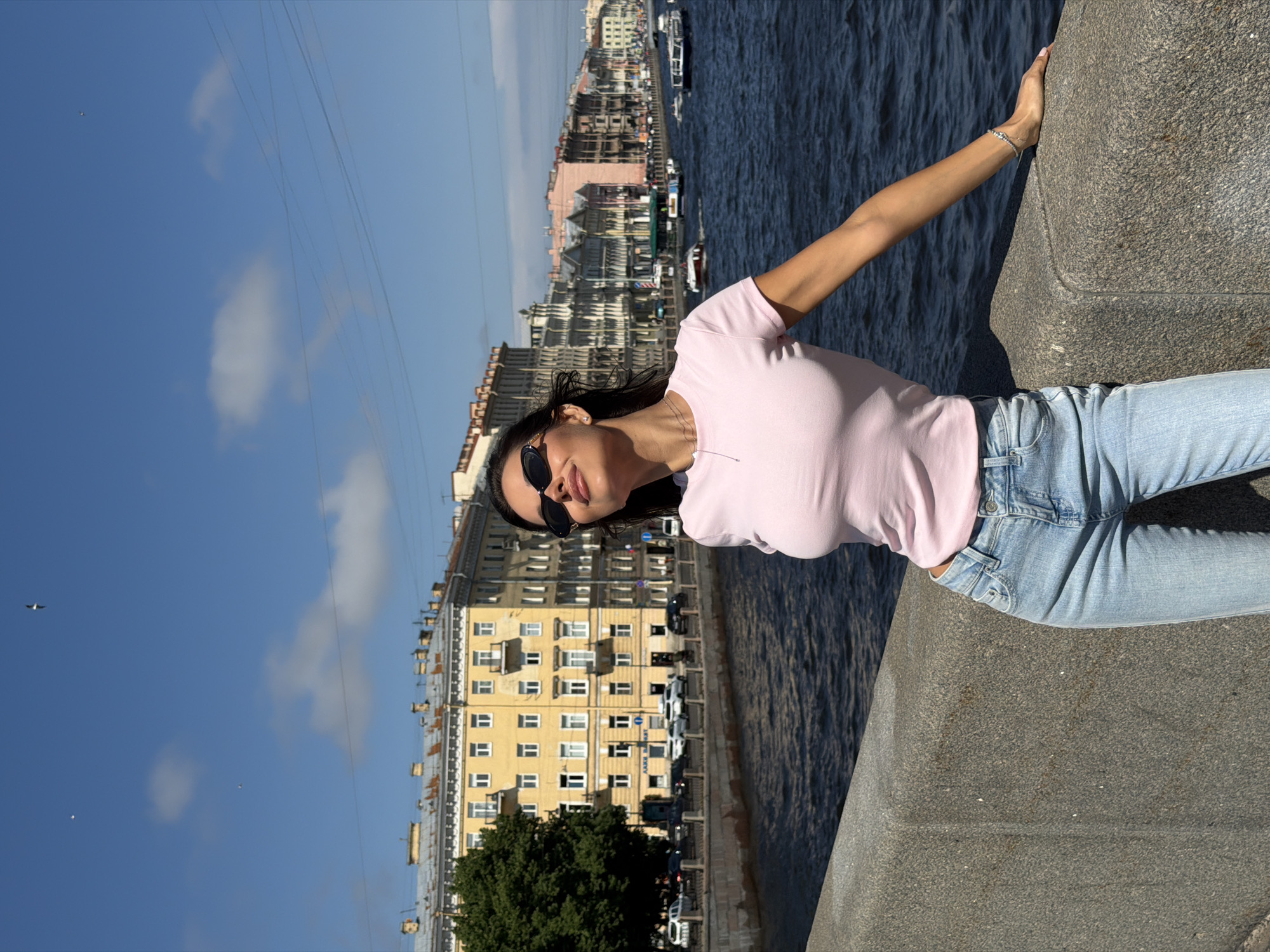 Woman in casual attire observed on Saint Petersburg embankment