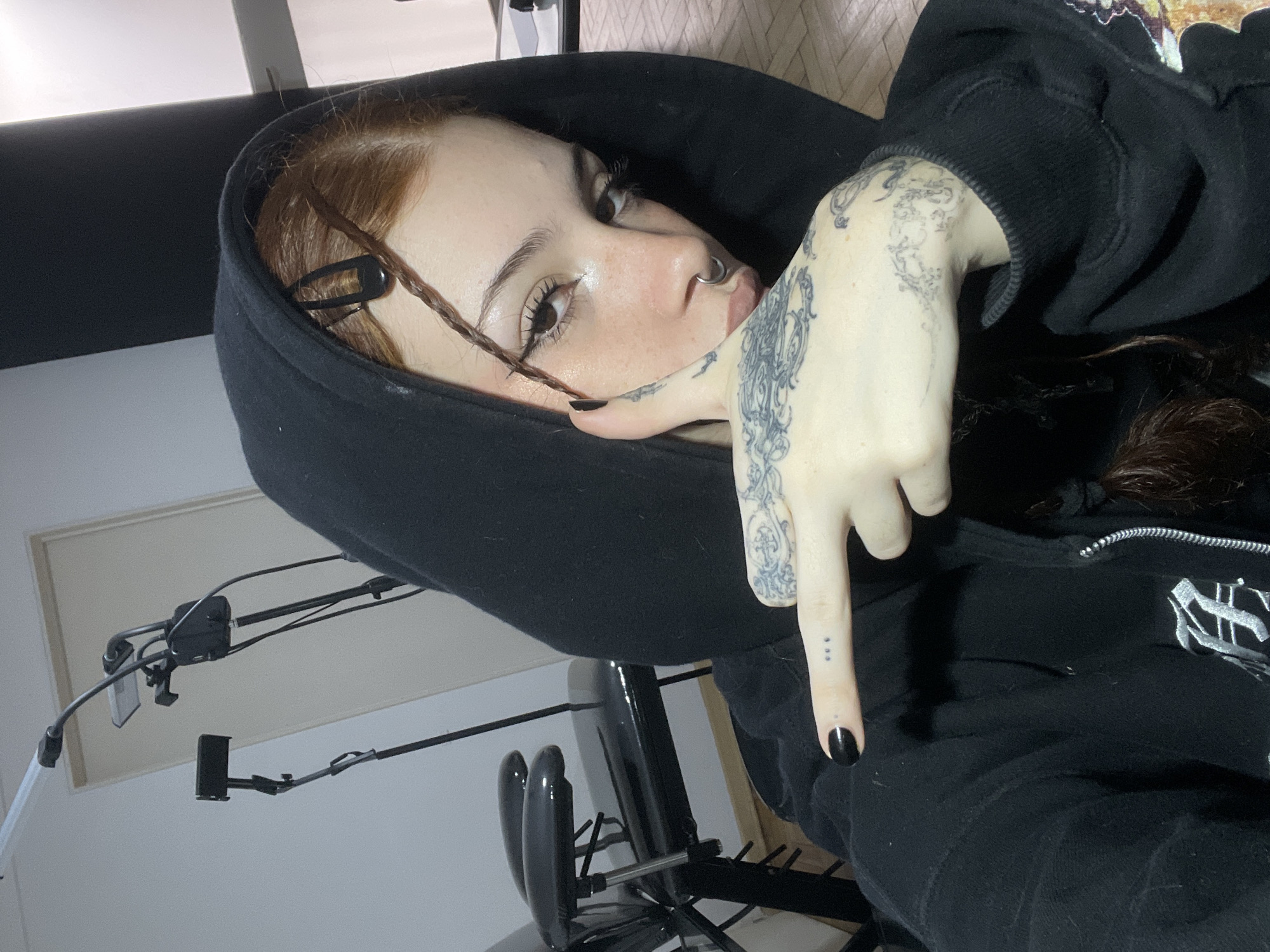 Woman Takes Selfie in Buenos Aires Indoor Location