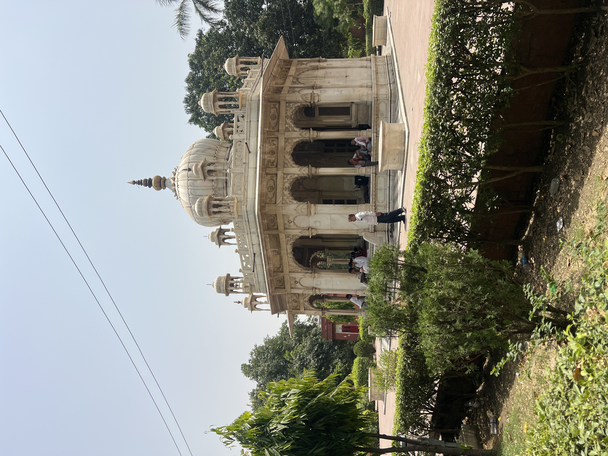 Morning gathering at marble monument in Varanasi documented