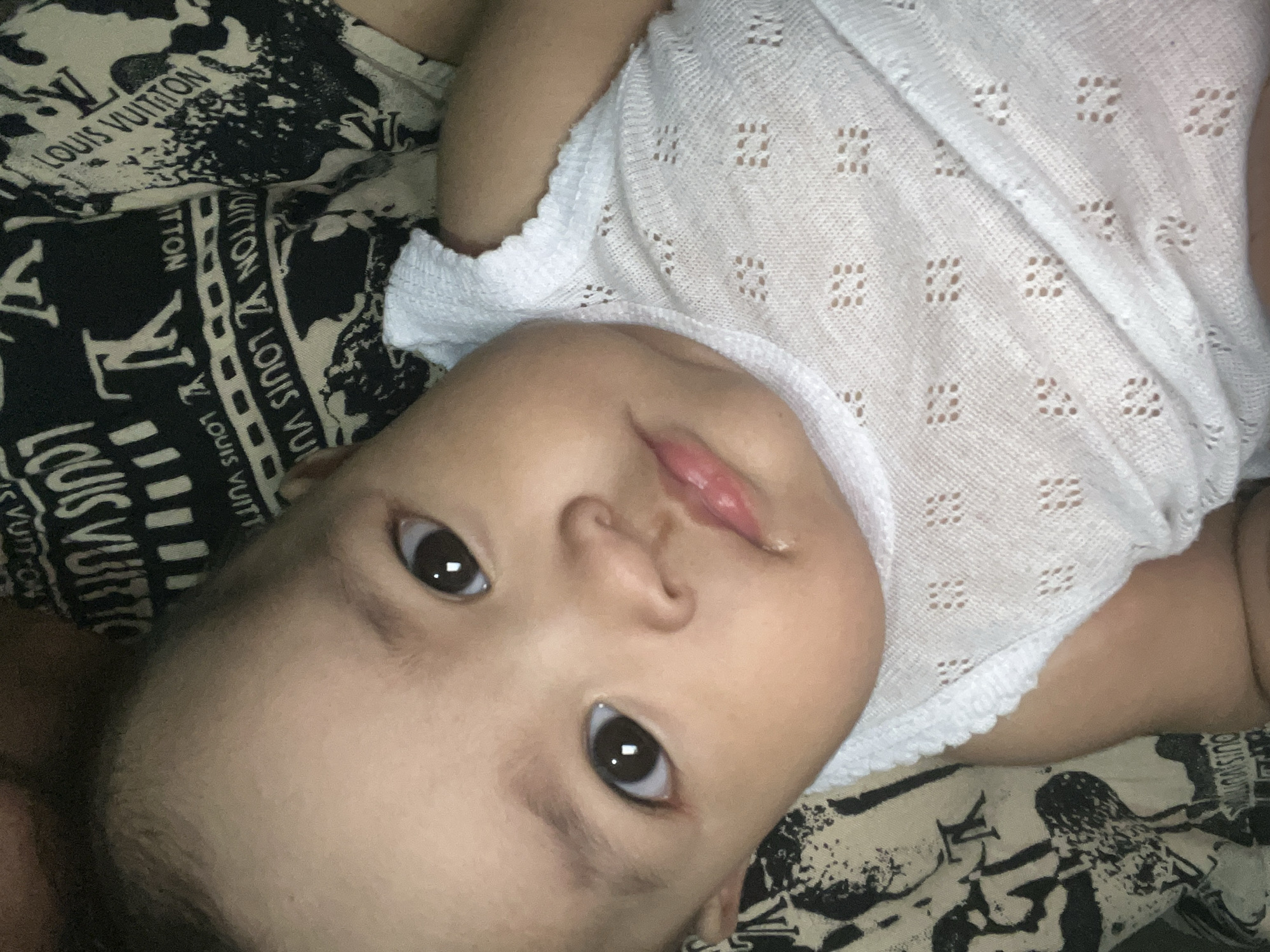 Close-up portraits of two small children in Kruengmate, Indonesia