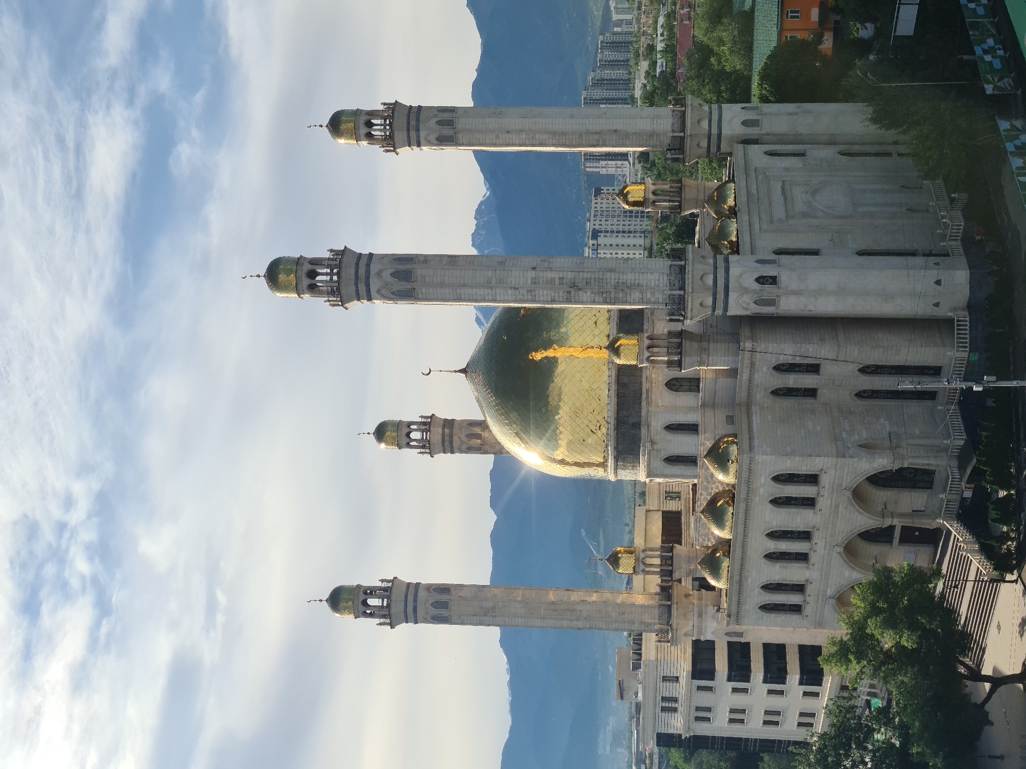Almaty's Central Mosque seen from ground and aerial perspectives