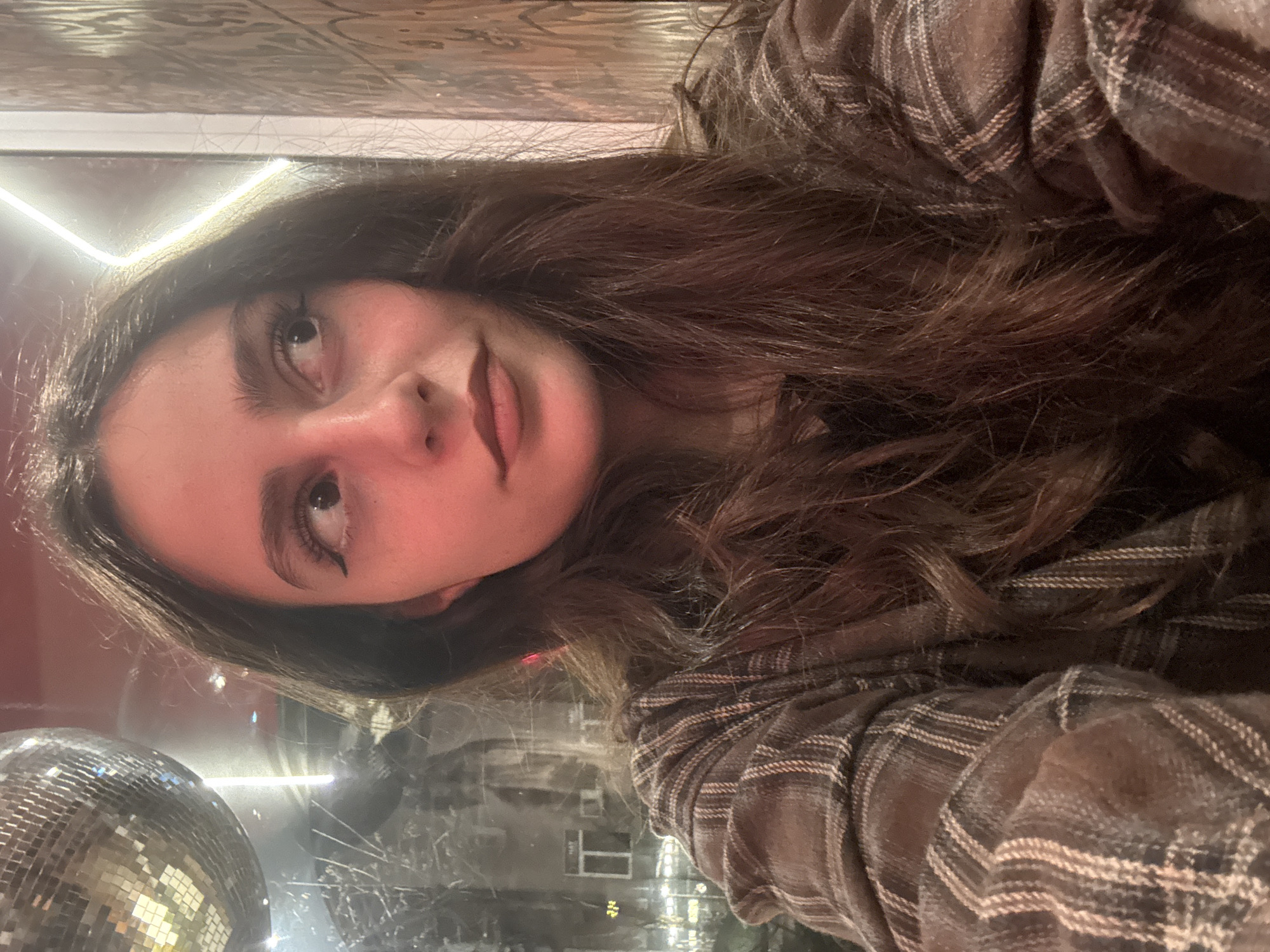 Woman enjoys coffee and selfies at Yerevan cafe