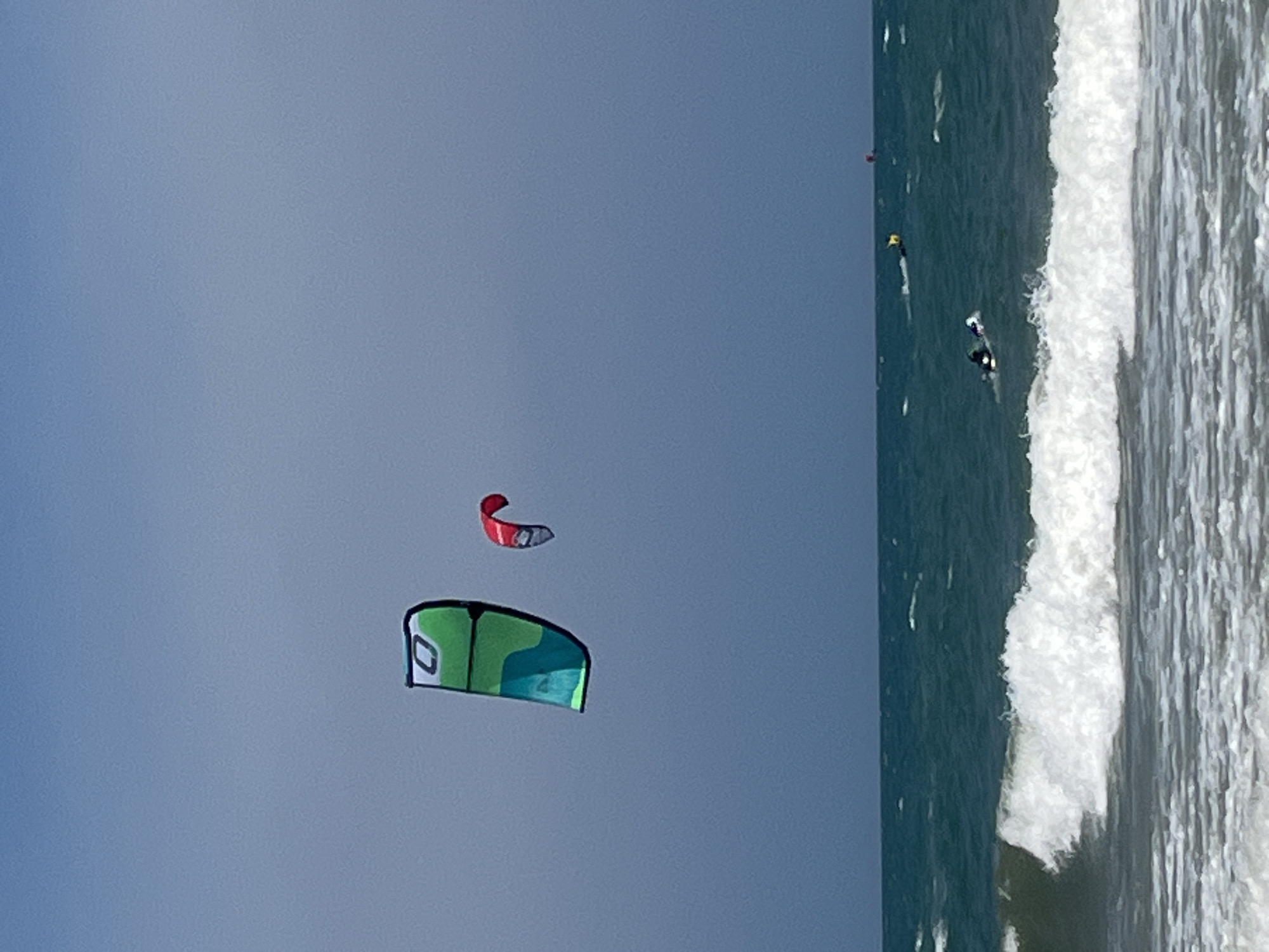 Breezy morning at Mui Ne with kite school action on the beach