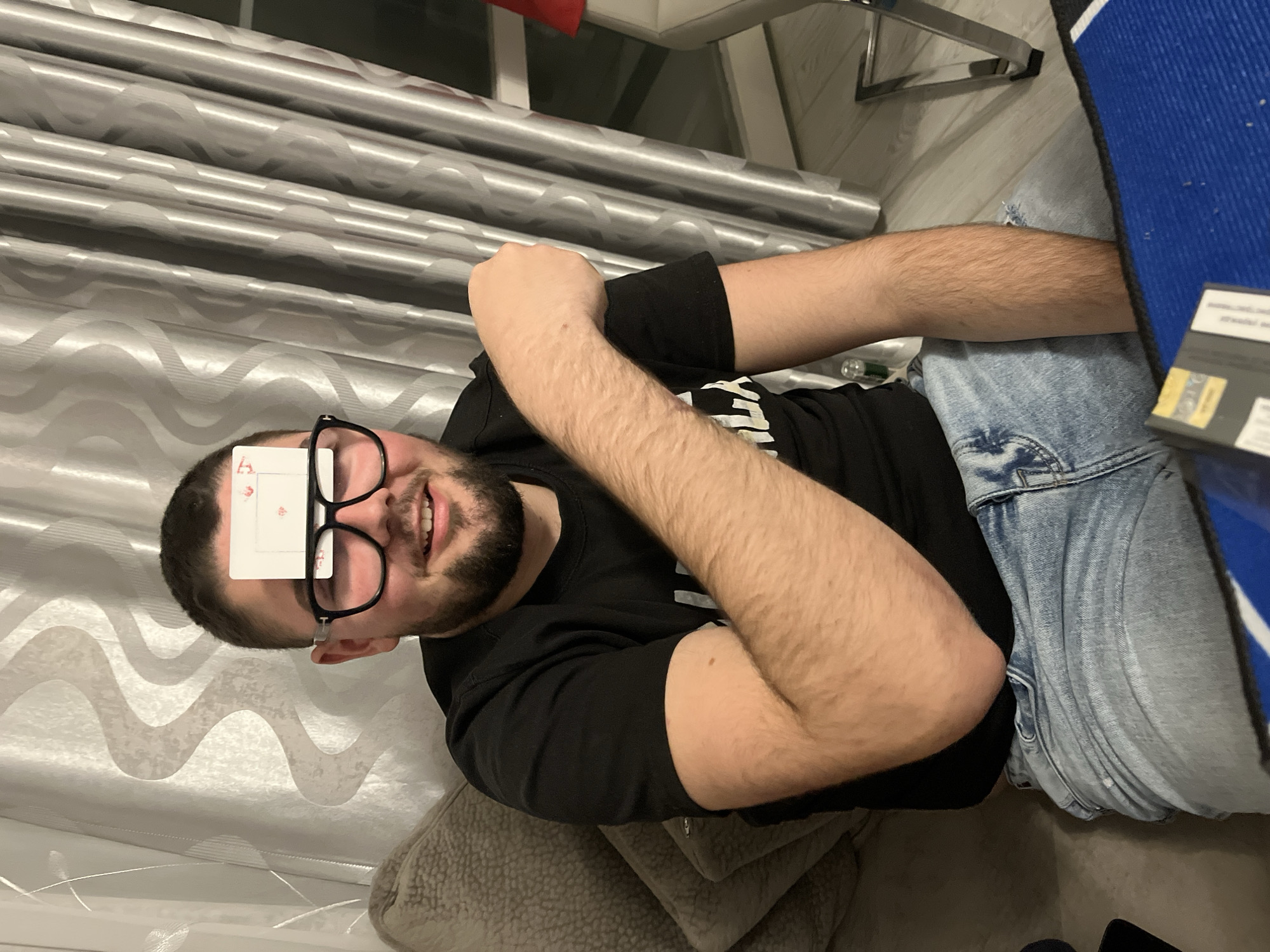 Man plays card guessing game in Burgas apartment