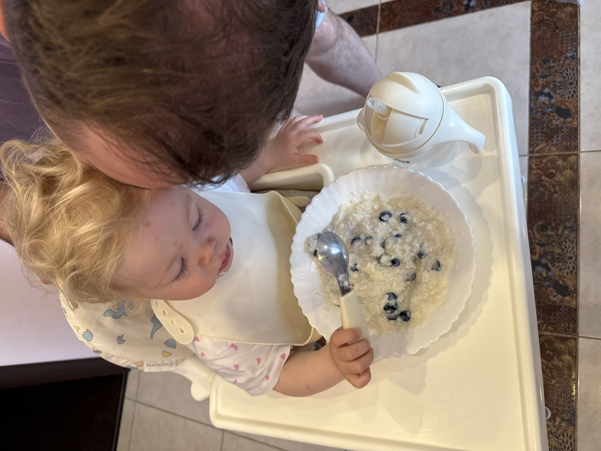 Family breakfast moment captured in Vladimir, Russia home