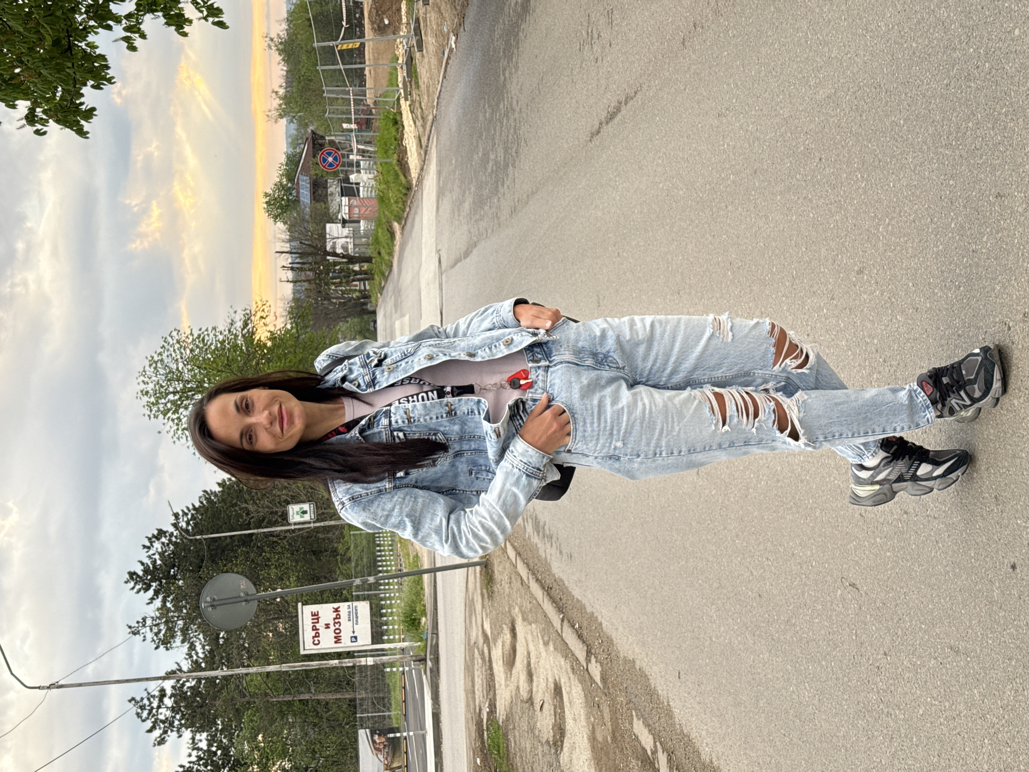 Woman spotted on Pleven street amid dramatic dawn clouds