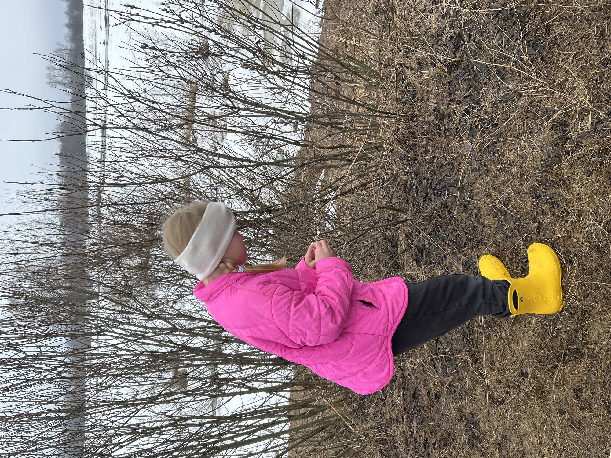 Child explores flood damage in rural Russian village