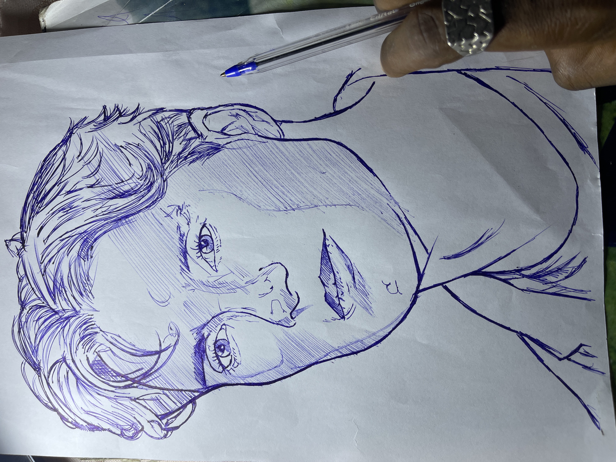 Ballpoint pen portrait sketches in Jos, Nigeria