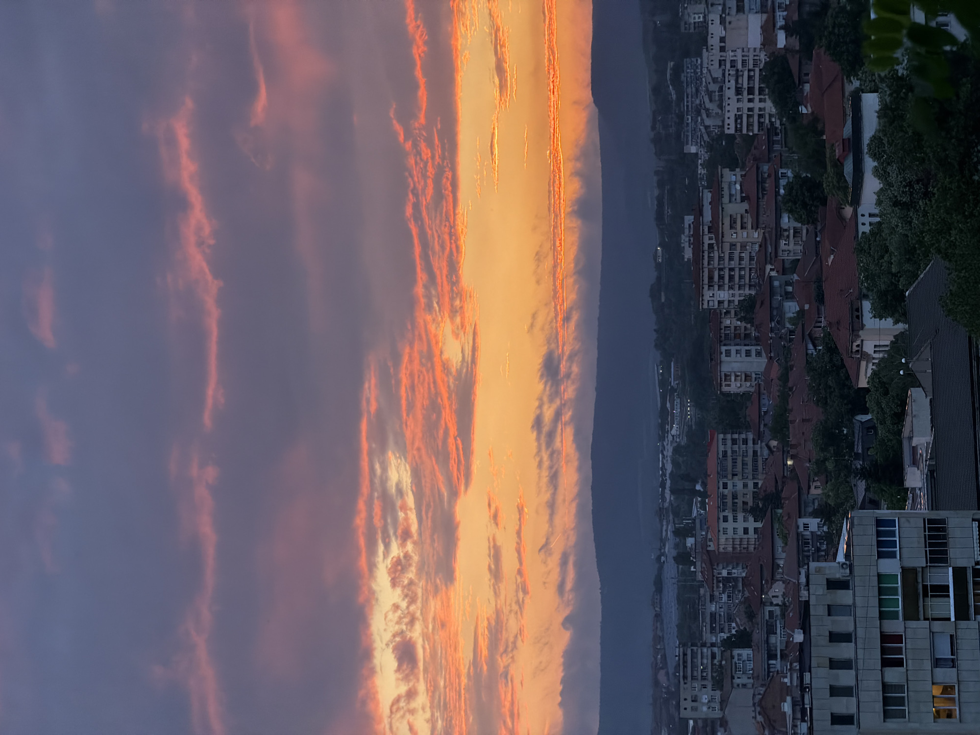Dramatic sunset illuminates Lovech, Bulgaria cityscape