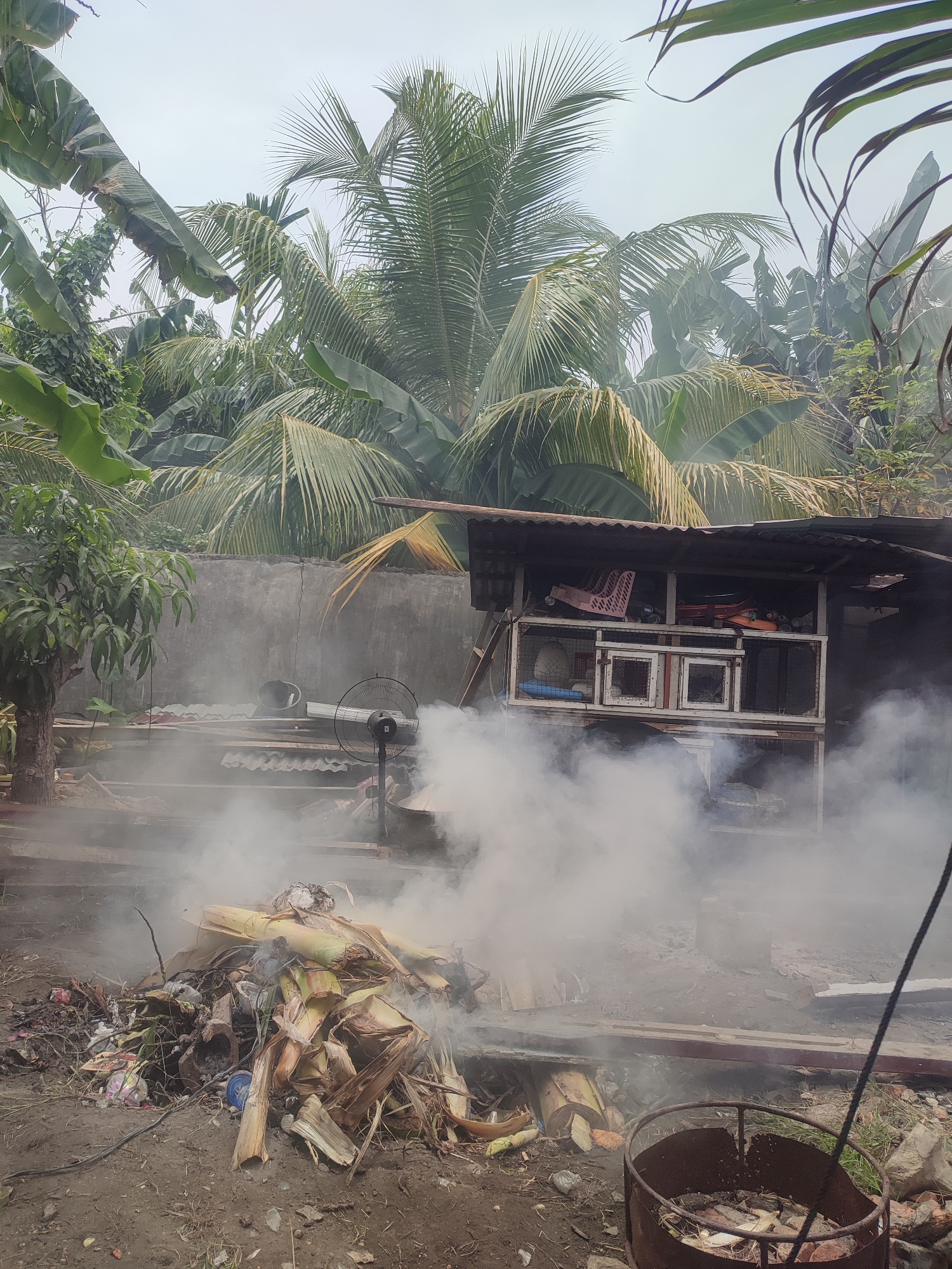 Large refuse pile burns in Gampongjawa, Indonesia