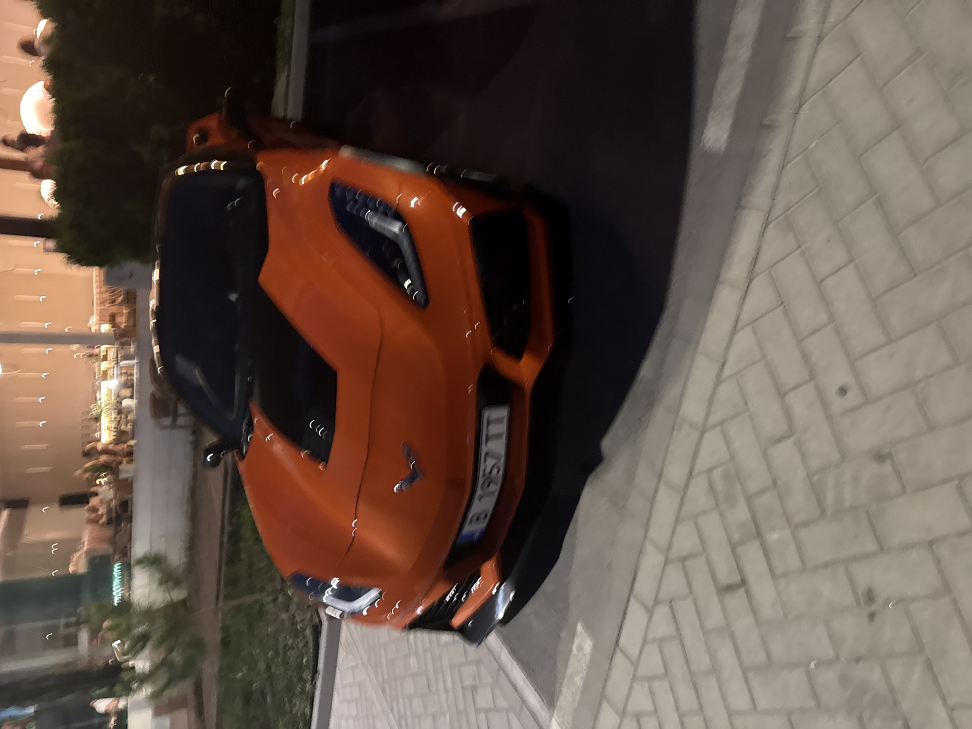 Evening out at a Varna restaurant, Corvette parked outside