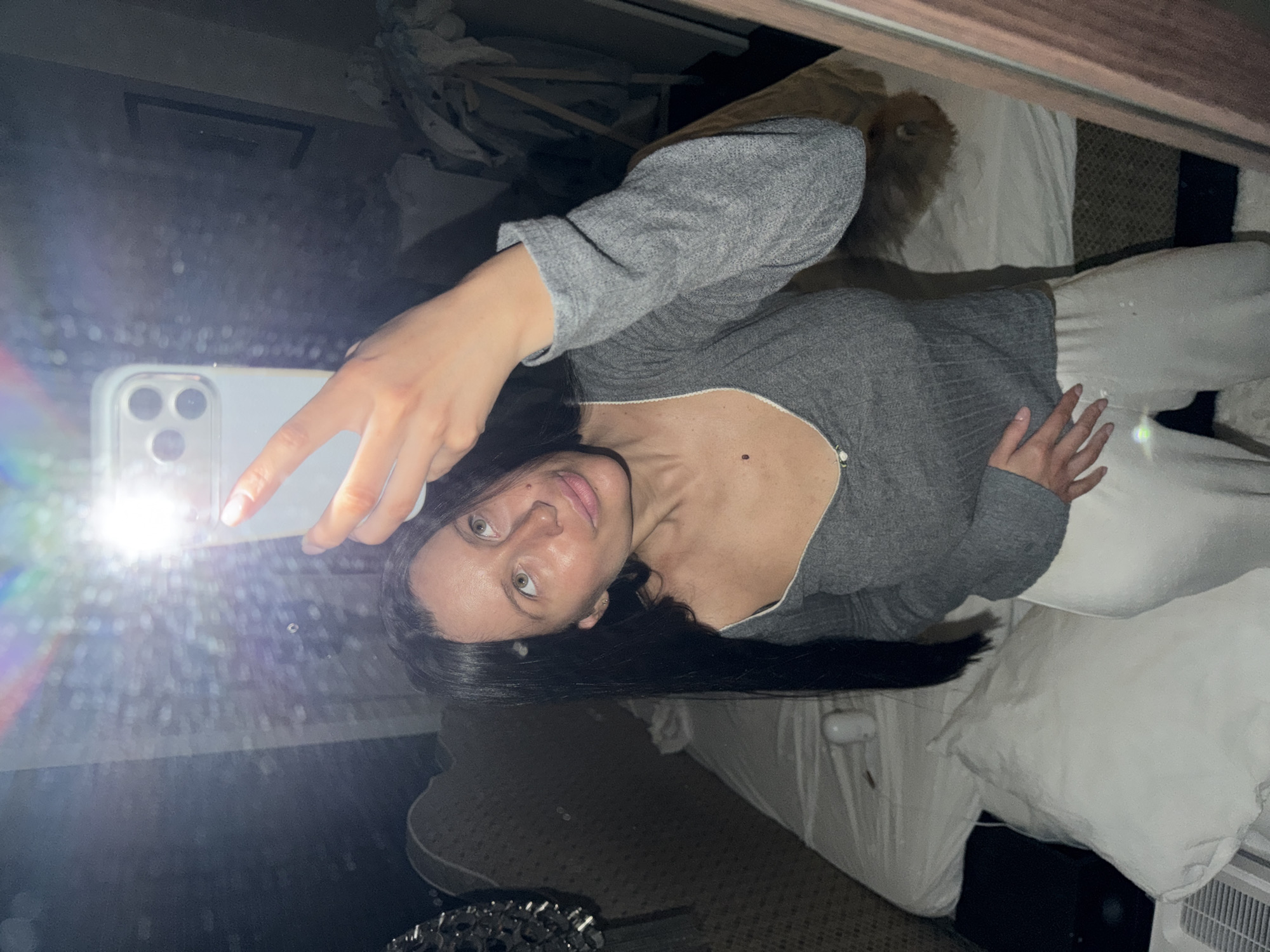 Woman takes mirror selfie in Khimki, Russia