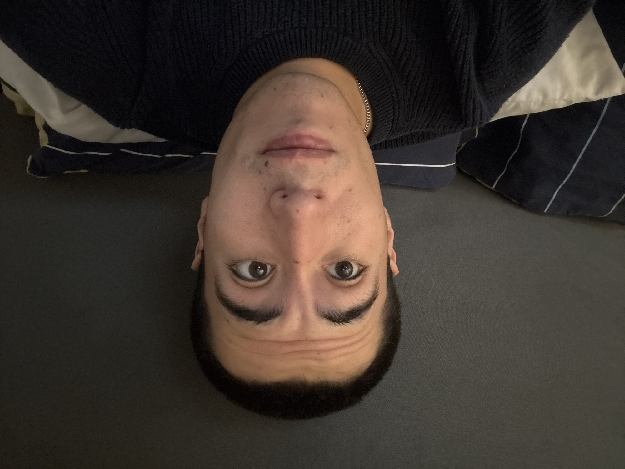 Person takes upside-down selfies during video call in Mexico