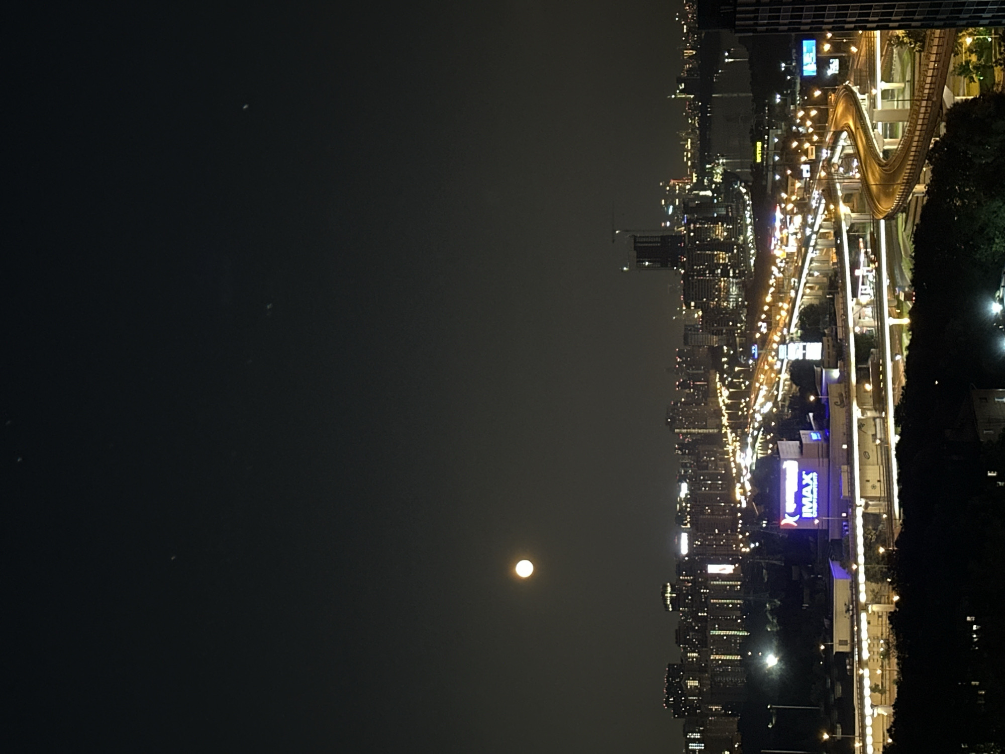 Moscow and Khimki glow under a full moon on a July night
