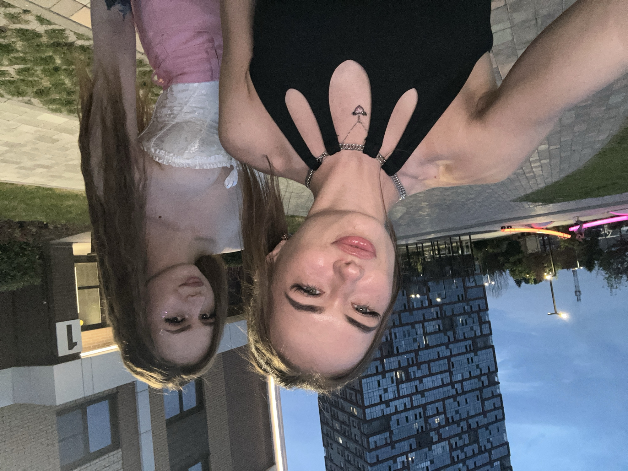 Selfie session in a black cut-out top, multiple angles