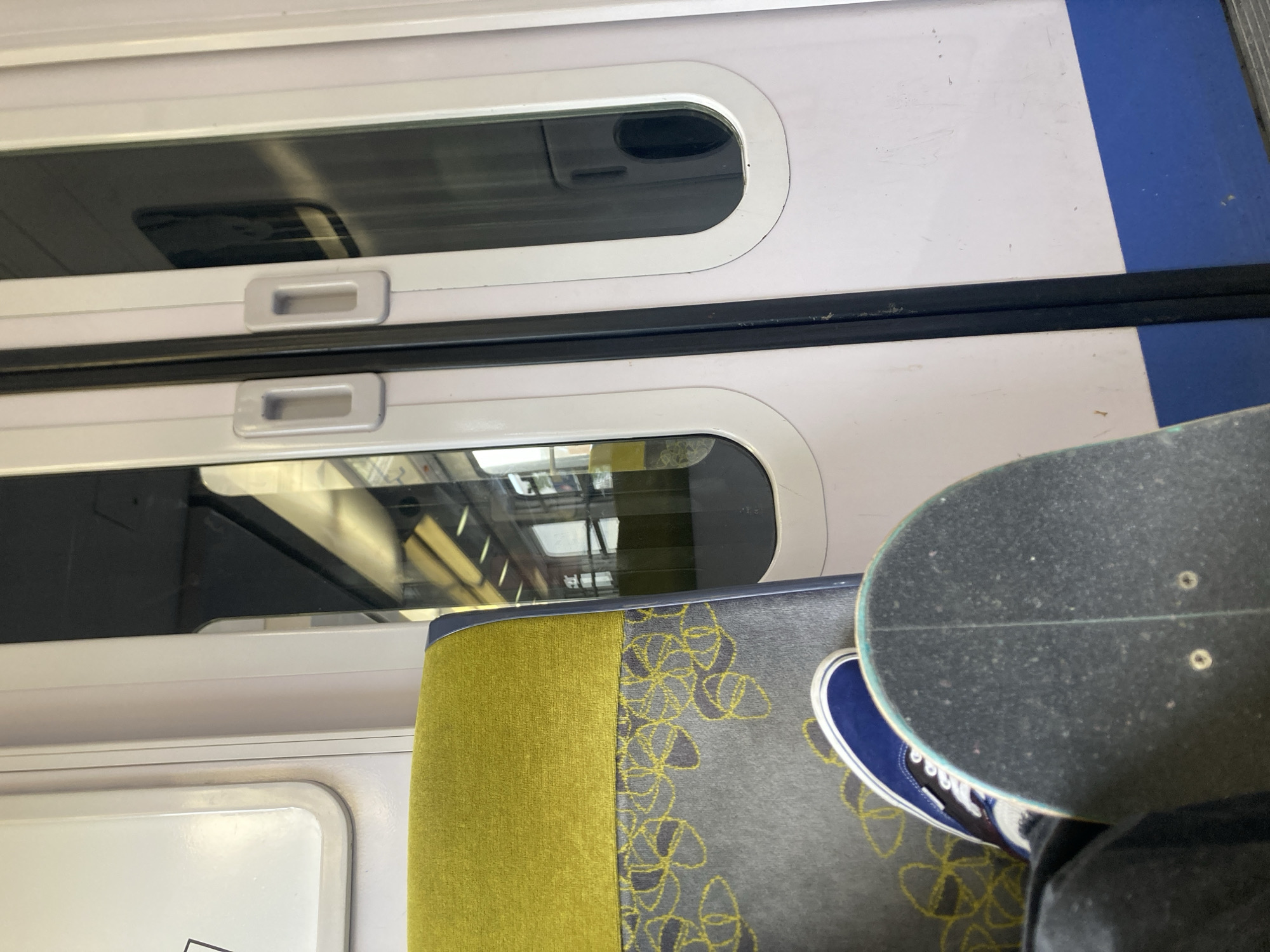 Train interior with skateboard observed in Villepinte, France
