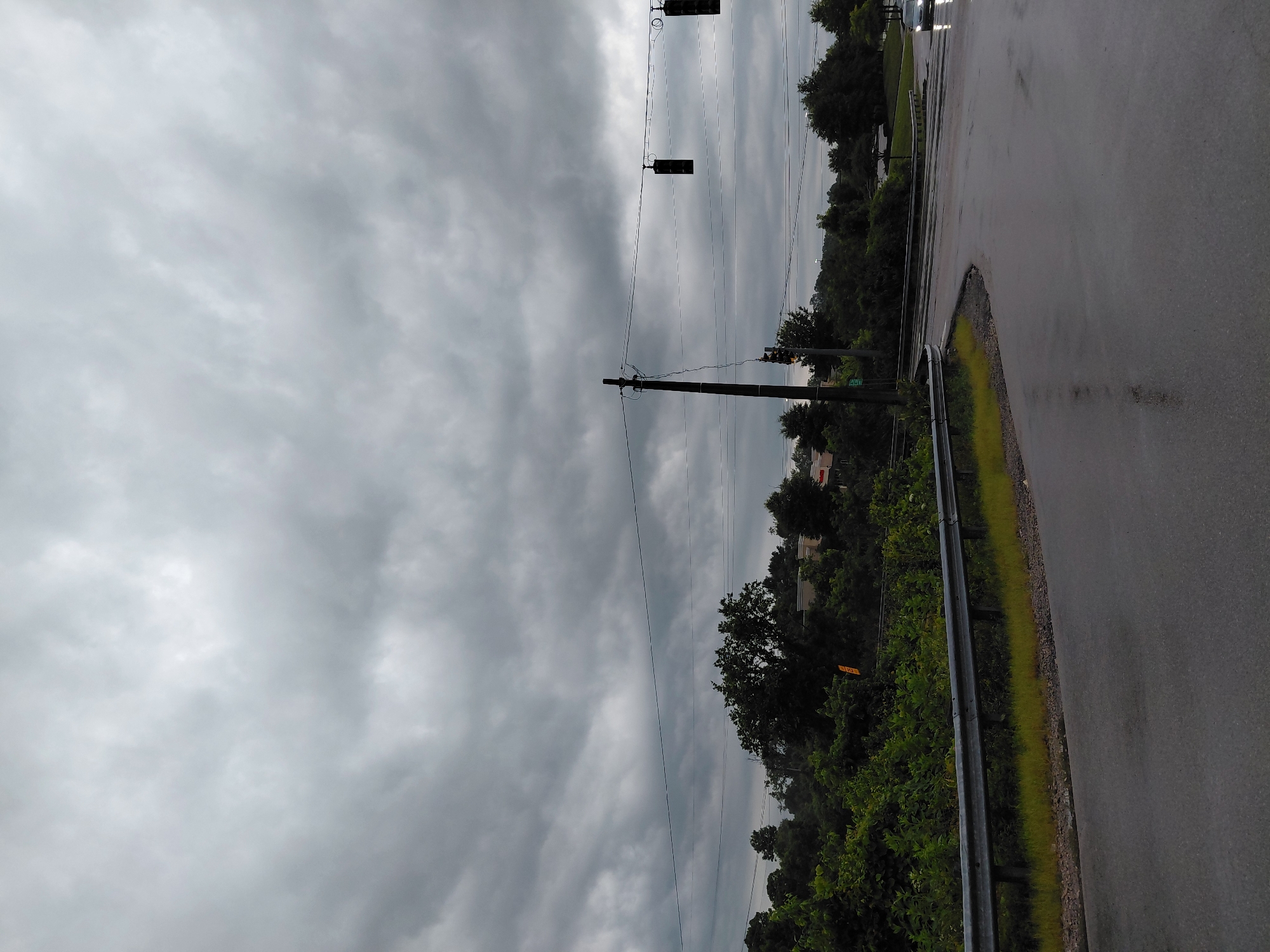 Wet curving road in Frankfort after recent rain