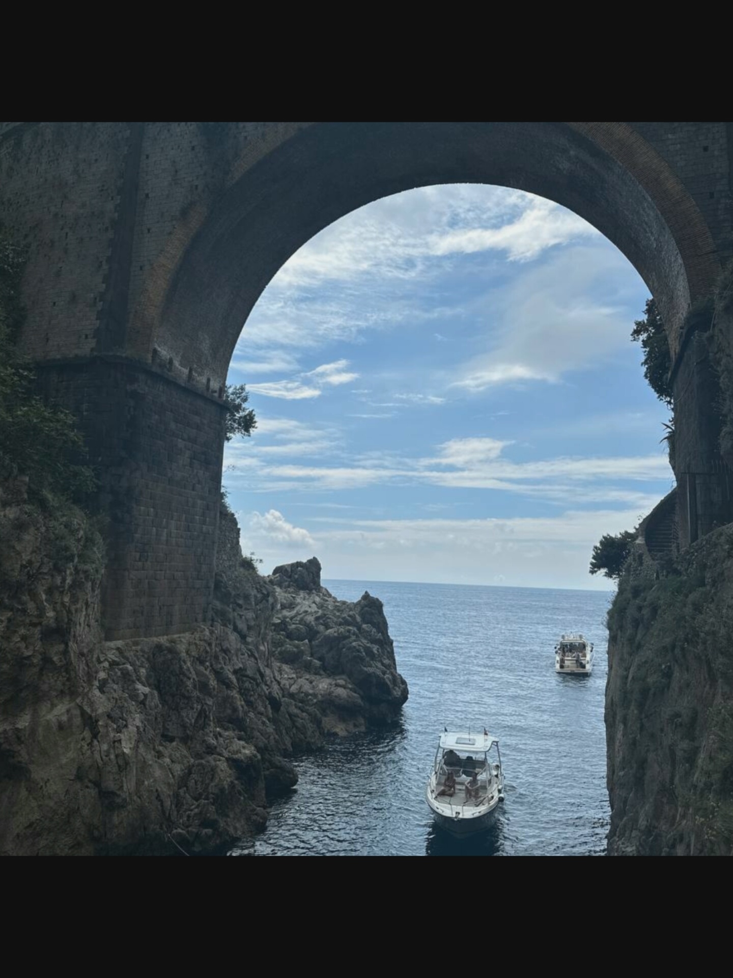 Fiordo di Furore's beach, cliffs, and coastal road up close