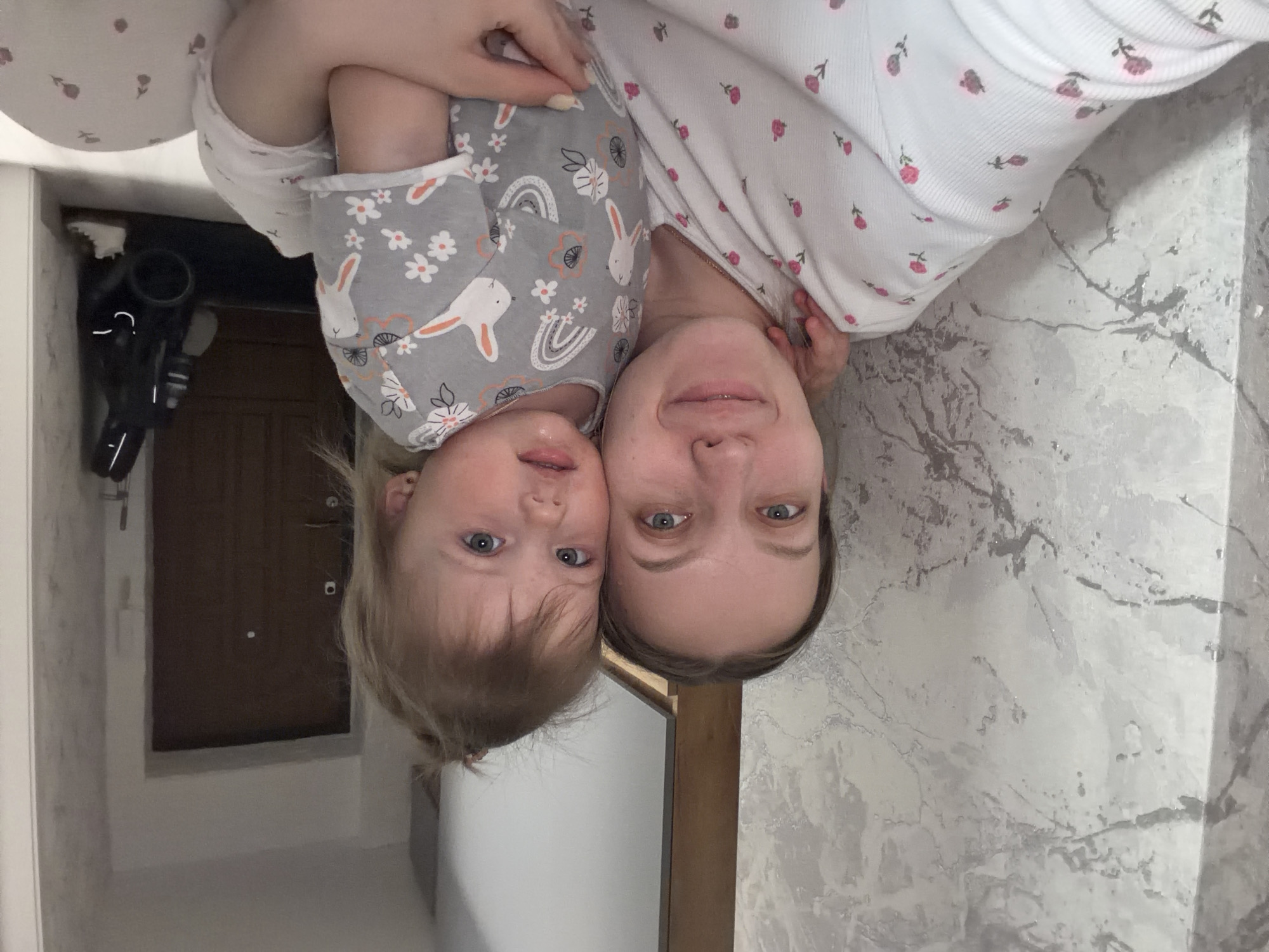Mother and toddler share domestic moments in Russian home