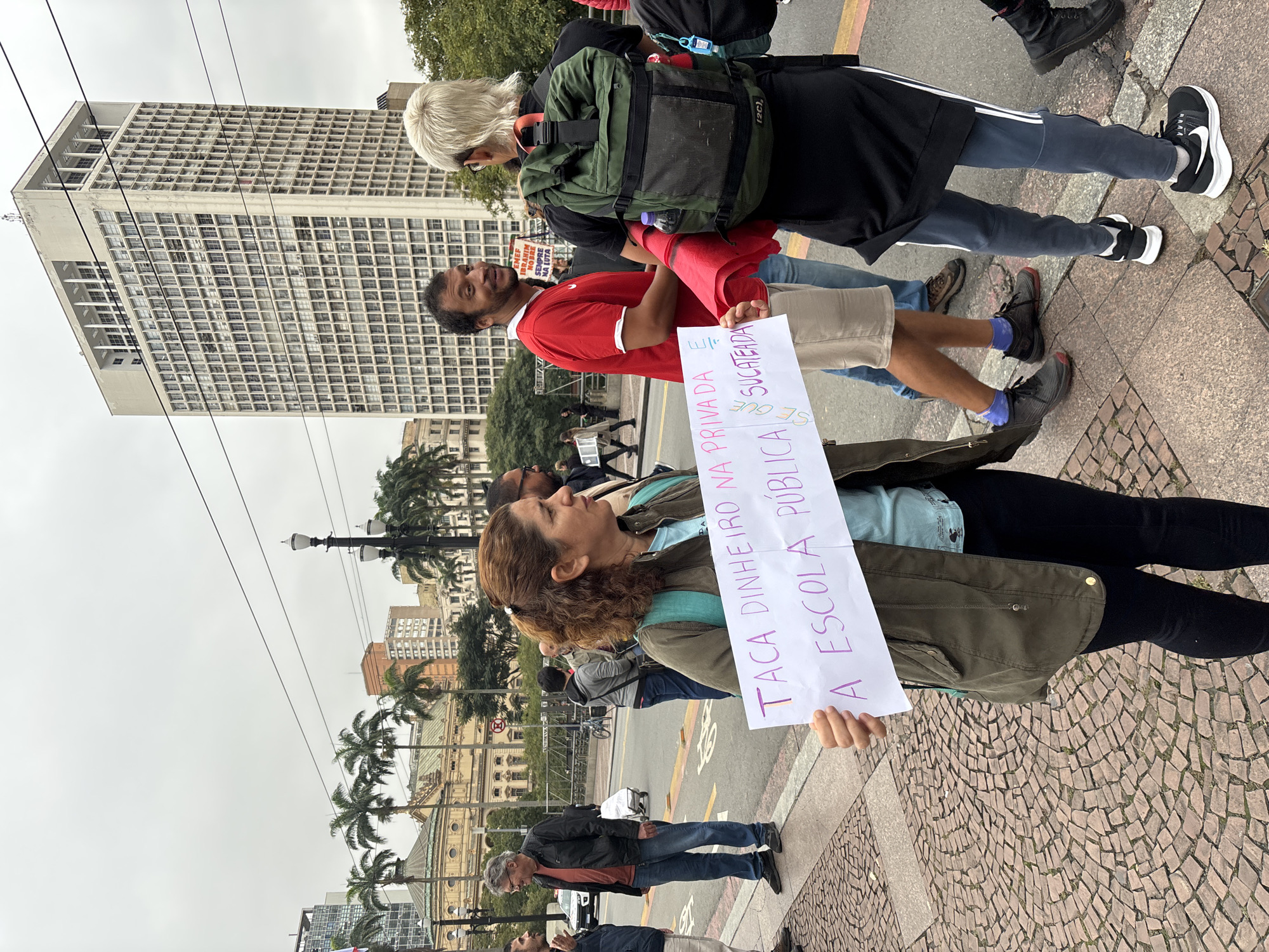 Woman protests education privatization in São Paulo demonstration