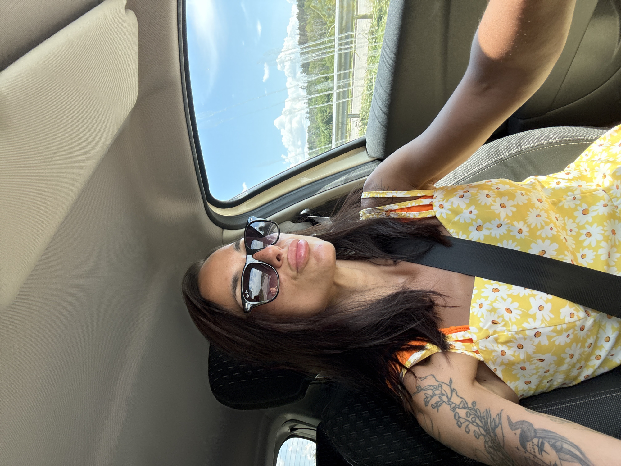 Cruising through Pleven in a daisy-print dress