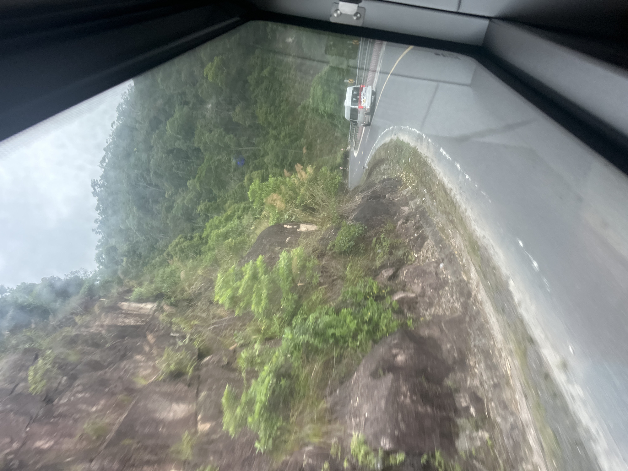 Cable car passenger documents mountainous terrain in Nam Khanh Vinh