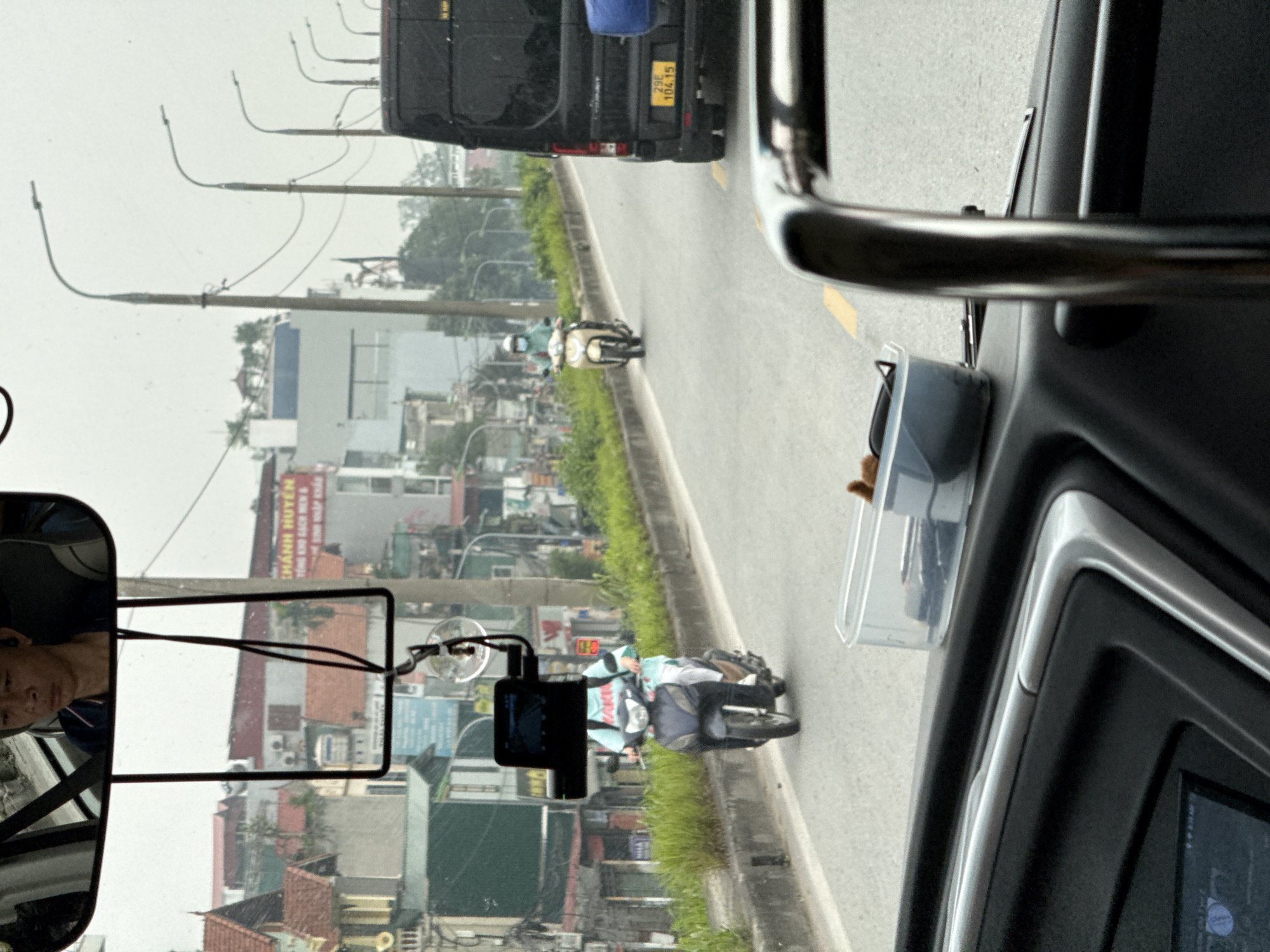 Contrasting urban traffic and green landscapes captured in Hà Nội
