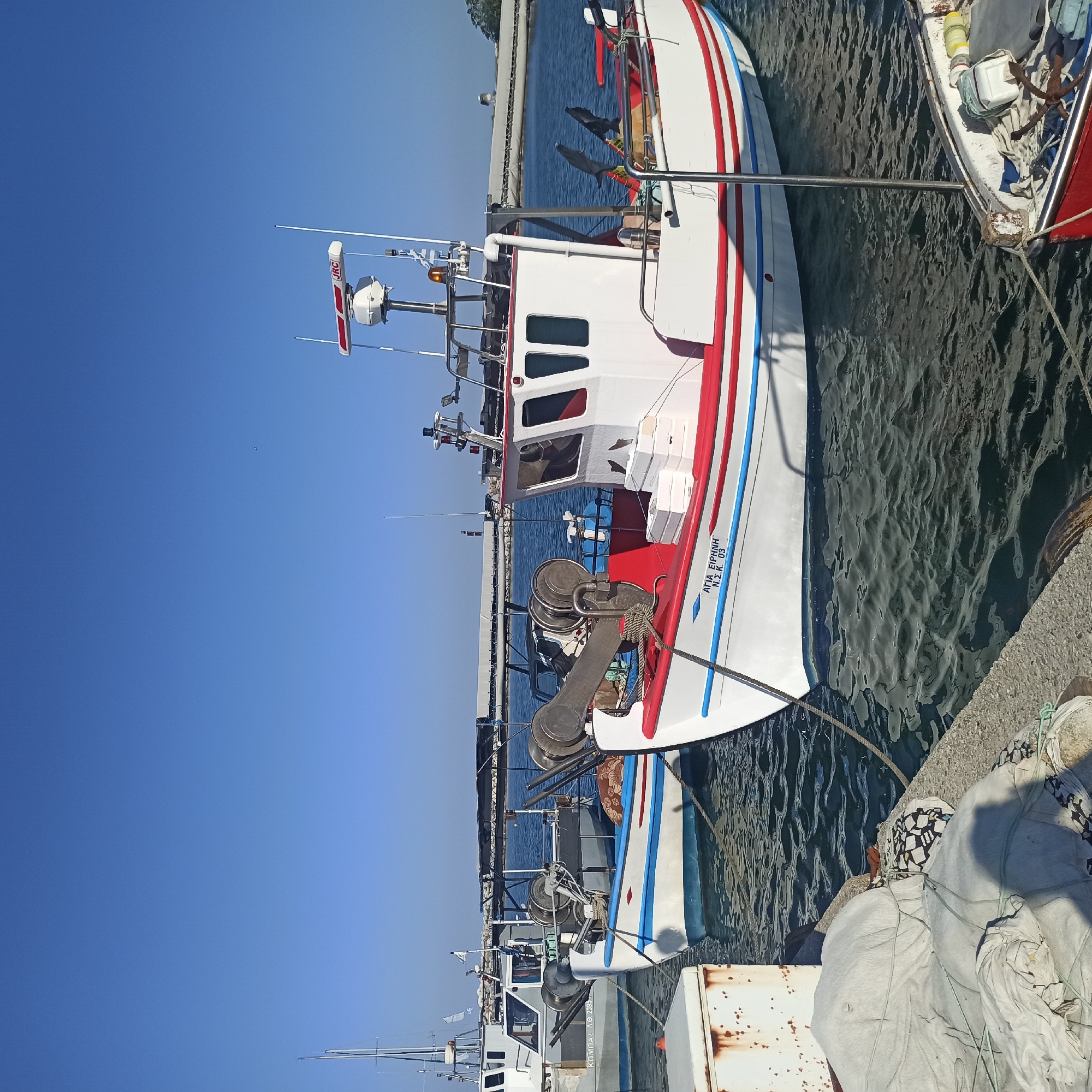 Lazy afternoon at a Greek fishing harbor