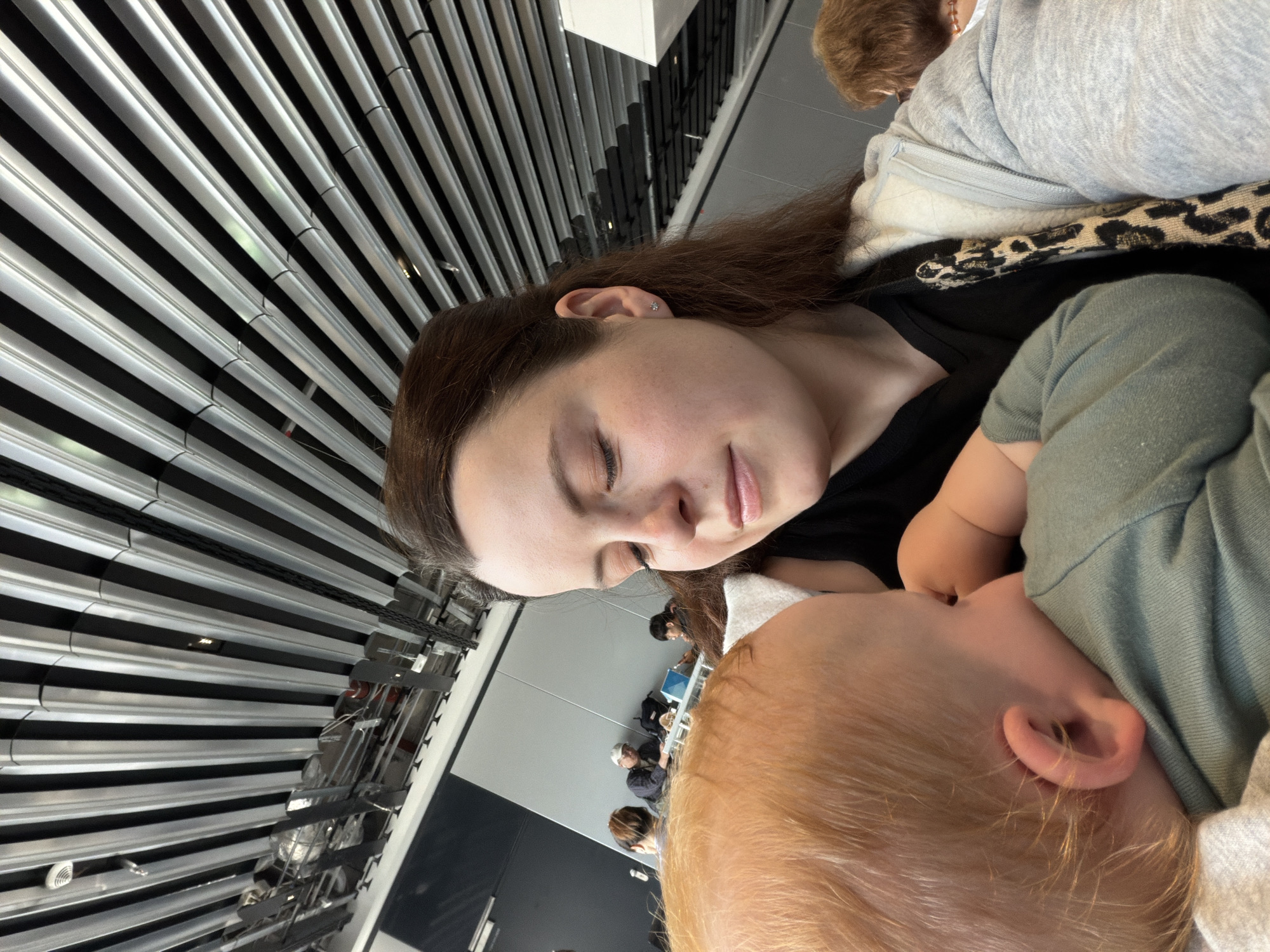 Woman rests with closed eyes in Frankfurt