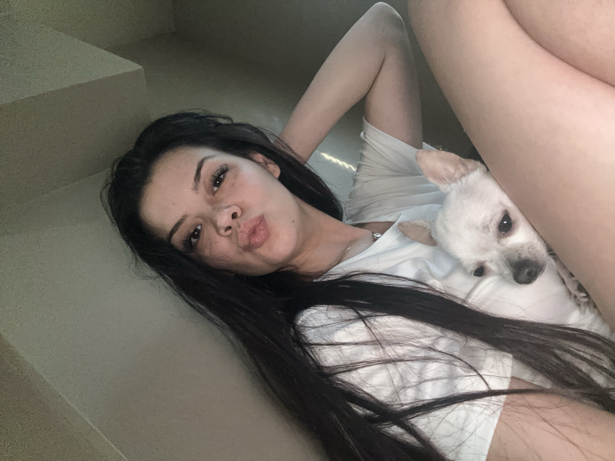 Woman and small dog photographed in casual selfies in Sliven
