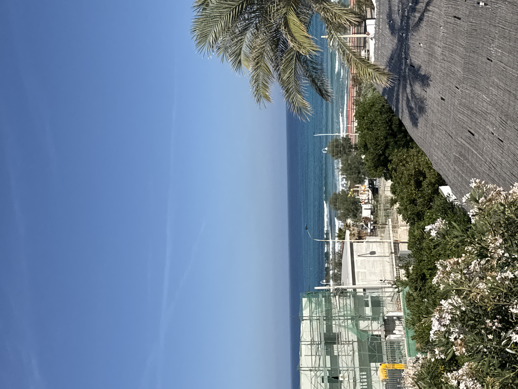 Sunny morning coastal life documented across Capaci, Italy