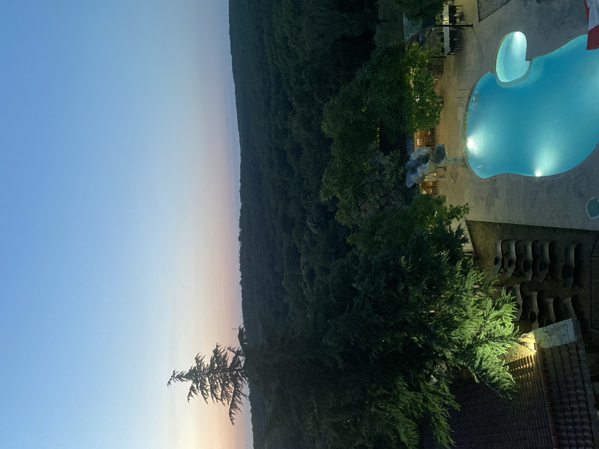 Dusk aerial of a poolside property in Sredets, Bulgaria