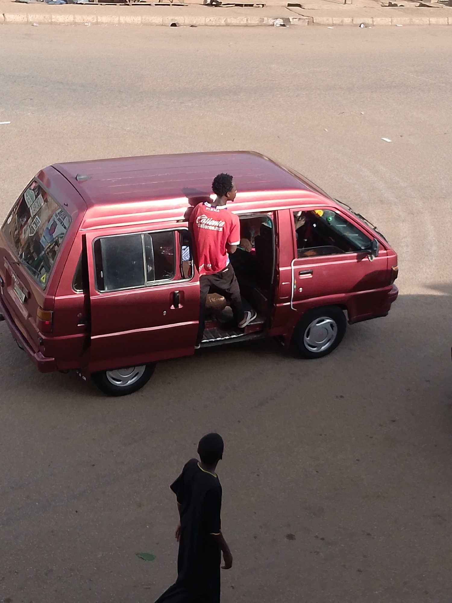 Morning street life in Bukuru, Nigeria