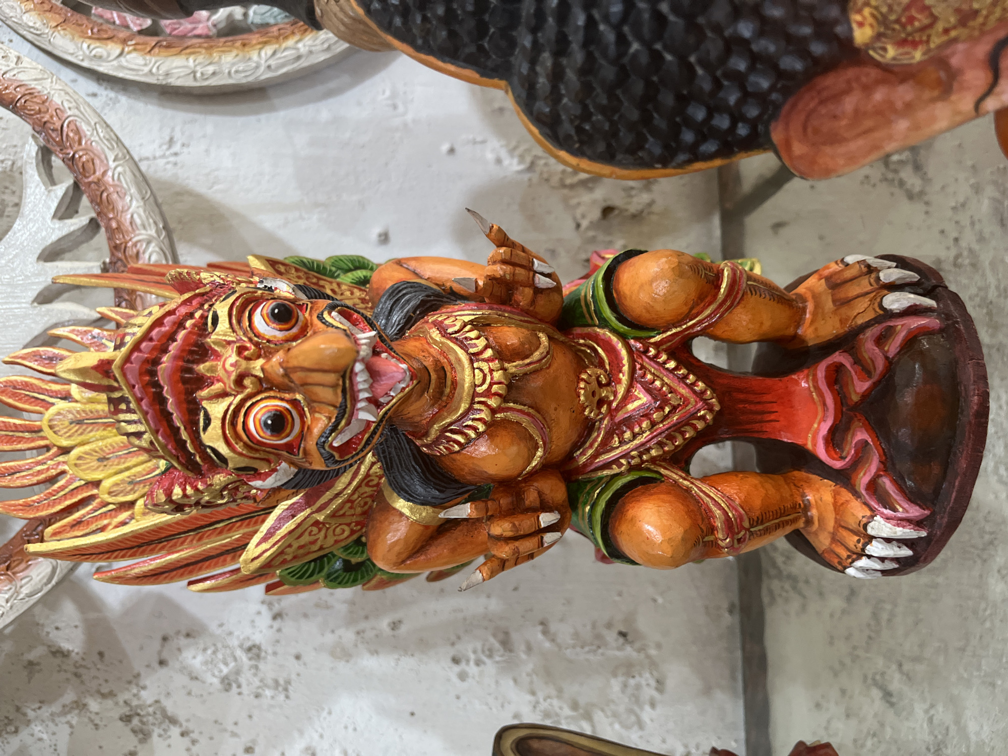 Tourist browses traditional craft shops in Ubud Indonesia