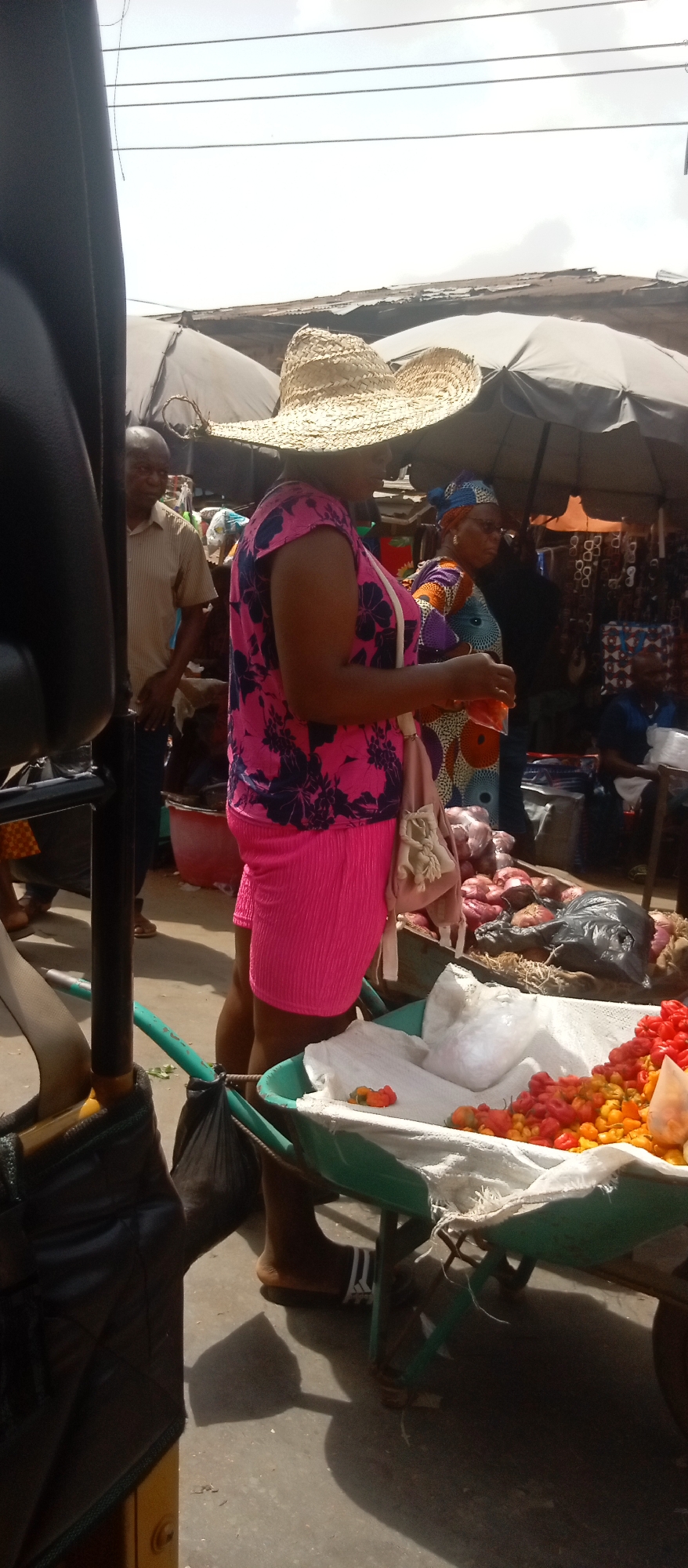 Busy midday market activity documented in Onitsha, Nigeria