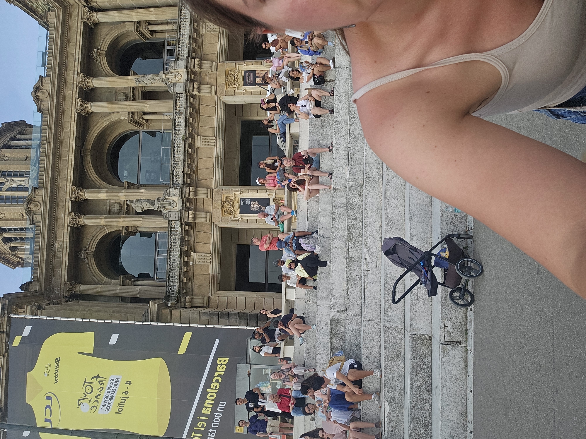 Montjuïc terrace buzzes with tourists, views, and a street guitarist