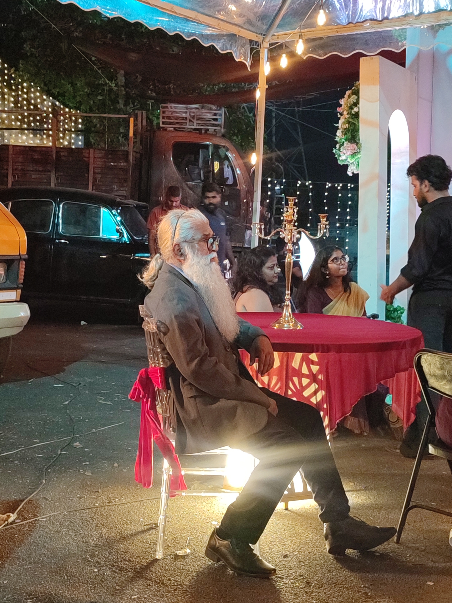 Evening outdoor gathering held in Kalamassery under decorated tent