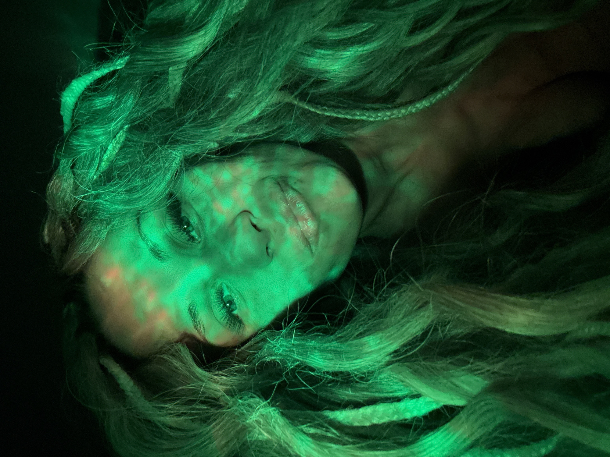 Portrait session with colored lighting captured in Rusanovo, Russia