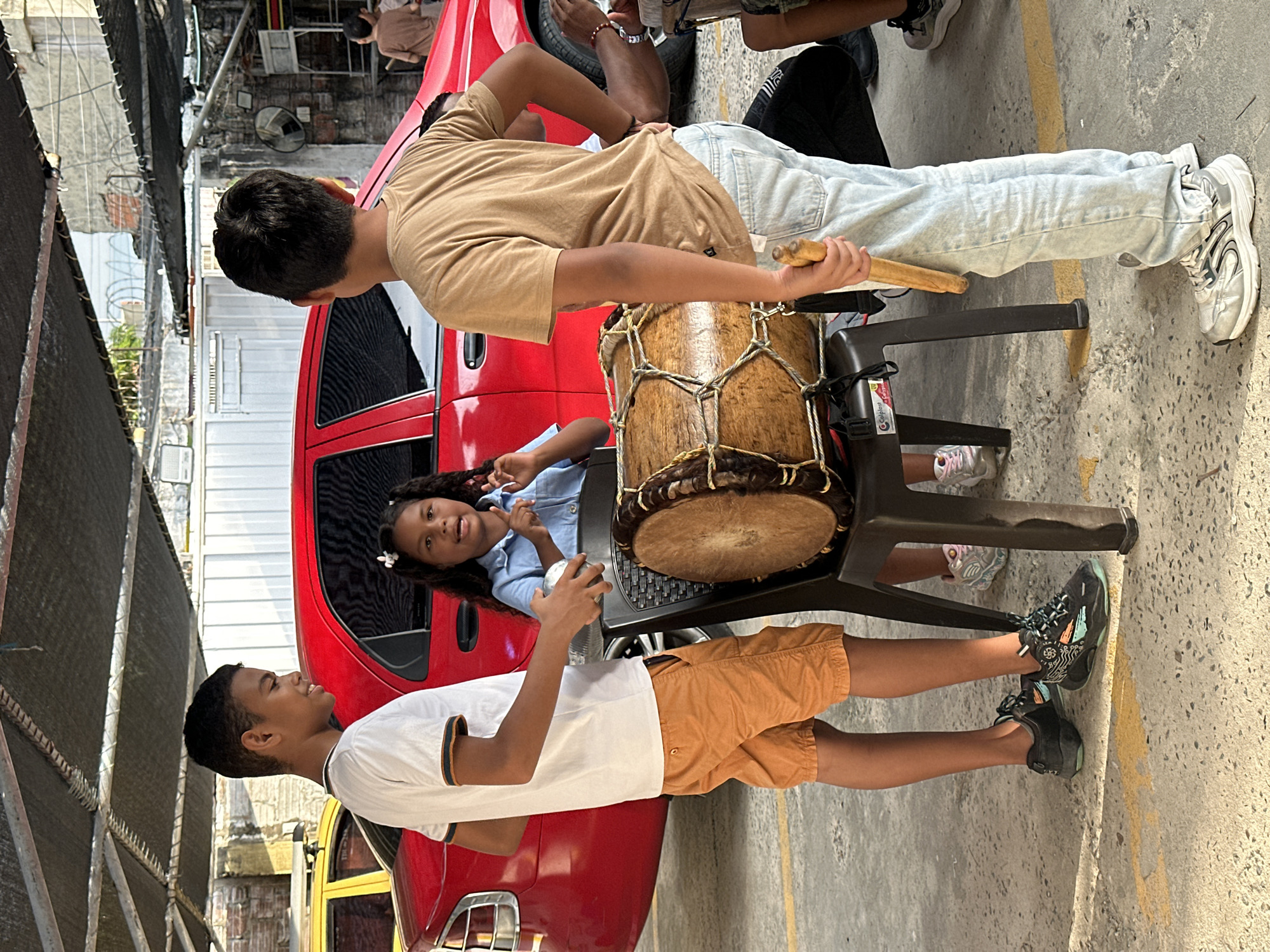 Community music event with children performing in Barranquilla