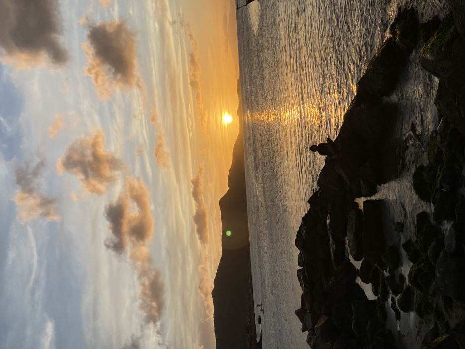 Sunset beach gathering draws paddleboarders, swimmers to Juan Griego